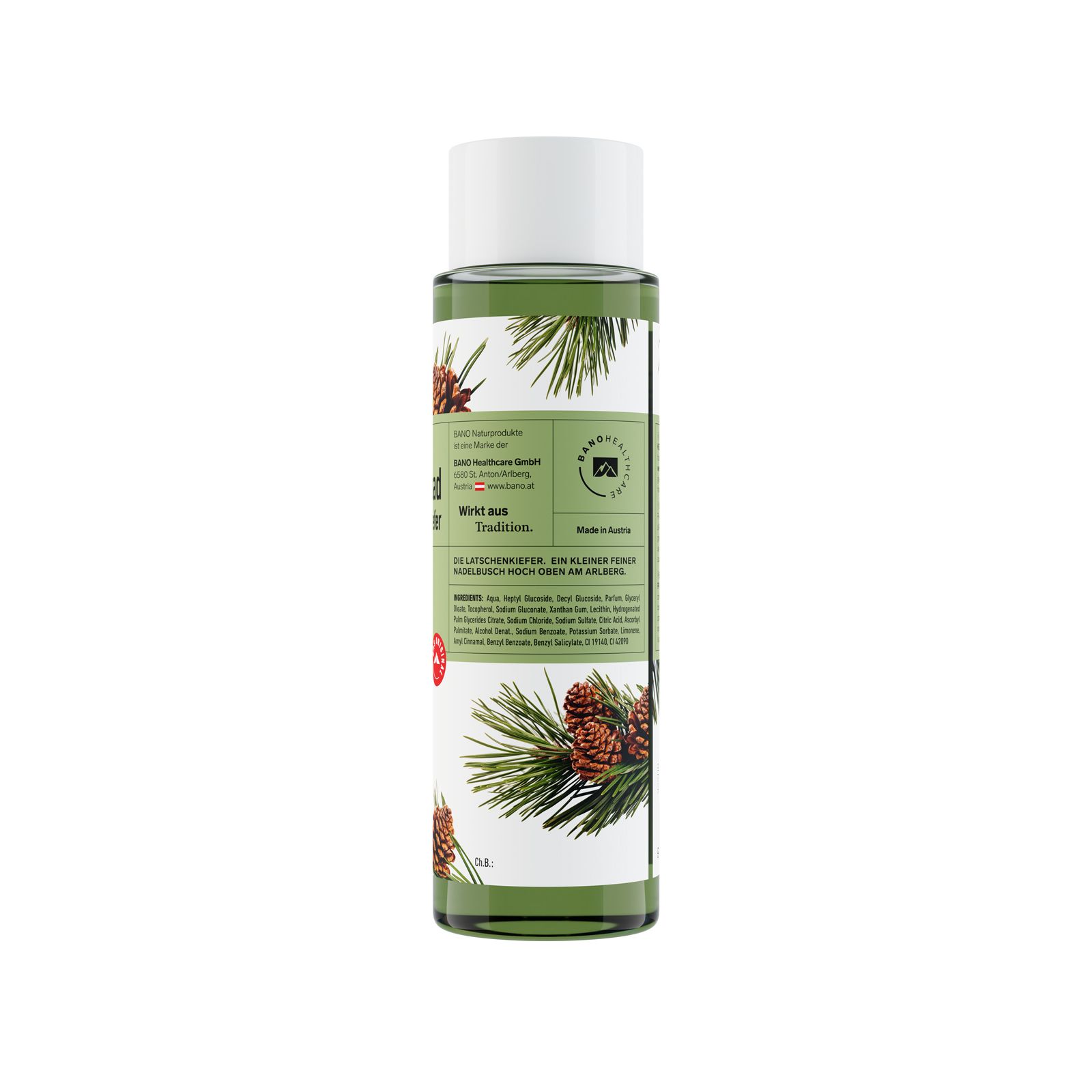 Achterkant van de groene fles. Etiket met tekst, dennentakken en kegels. Gemaakt in Oostenrijk.