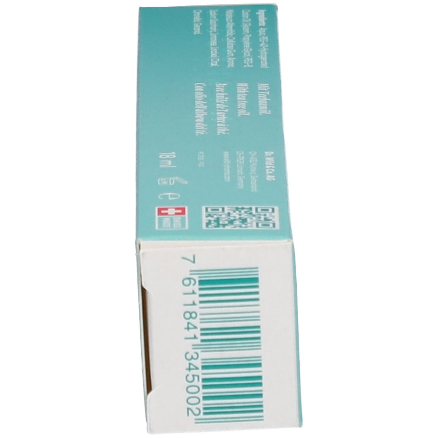 Doos, onderkant. Barcode. Opschrift: TEBODONT® Gel. Zwitsers kruis. 18 ml.