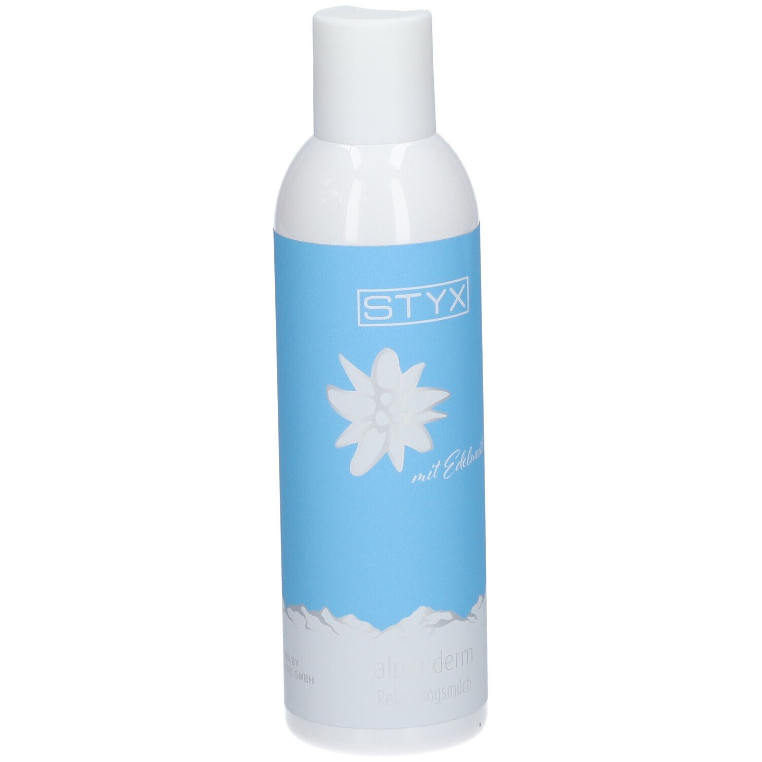 Flacon blanc avec étiquette bleue. Logo STYX, fleur d'edelweiss, texte: mit Edelweiß, alpin derm Reinigungsmilch. Motif montagne.