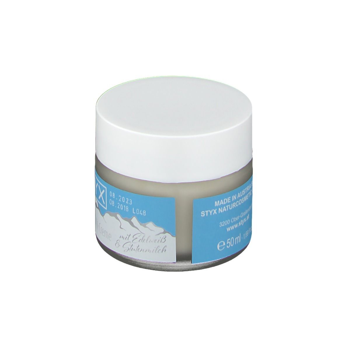 Pot de crème à couvercle blanc. Étiquette bleue: STYX, alpin derm 24h-Creme mit Edelweiss. 50ml.