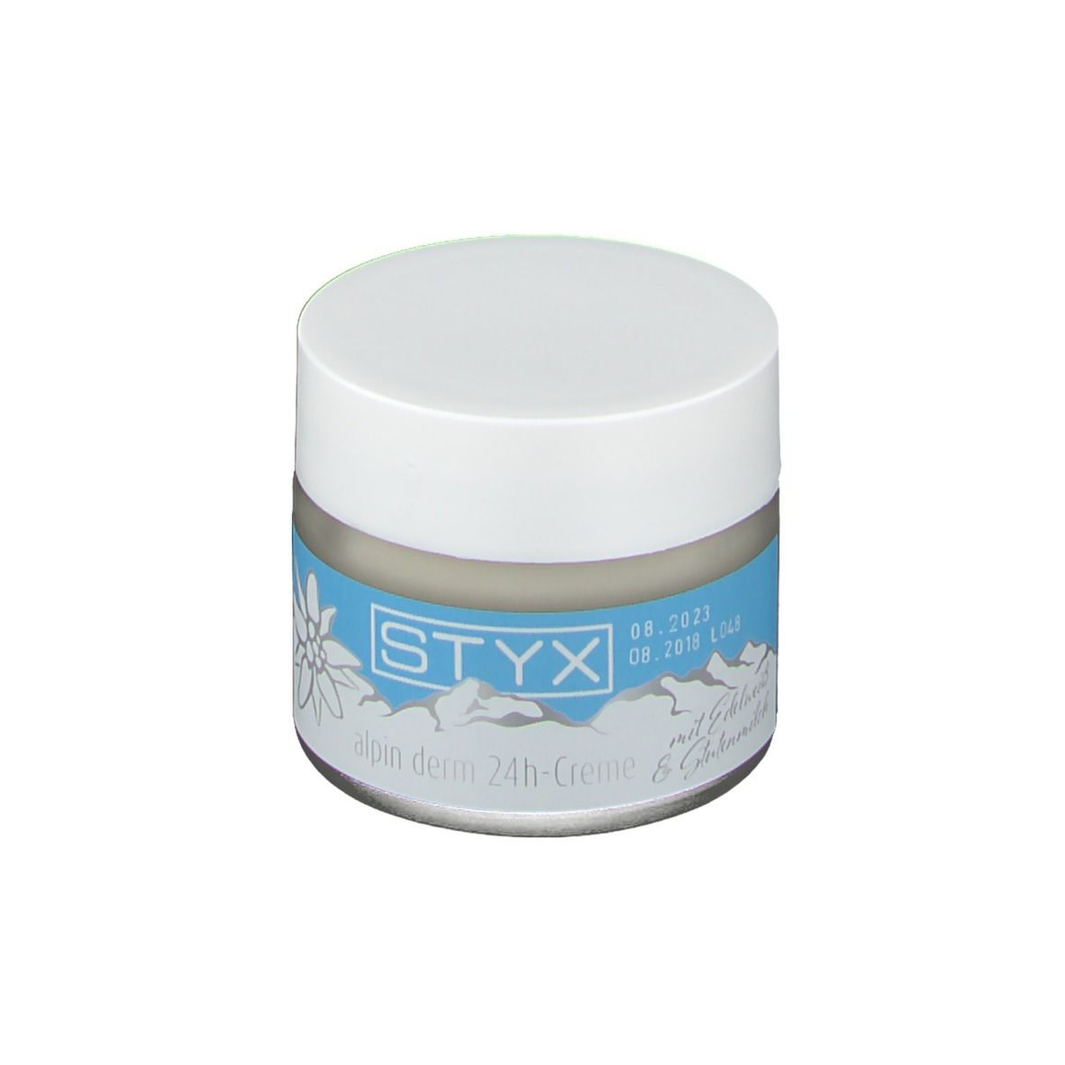 Pot de crème à couvercle blanc. Étiquette bleue: STYX, alpin derm 24h-Creme mit Edelweiss. Logo.