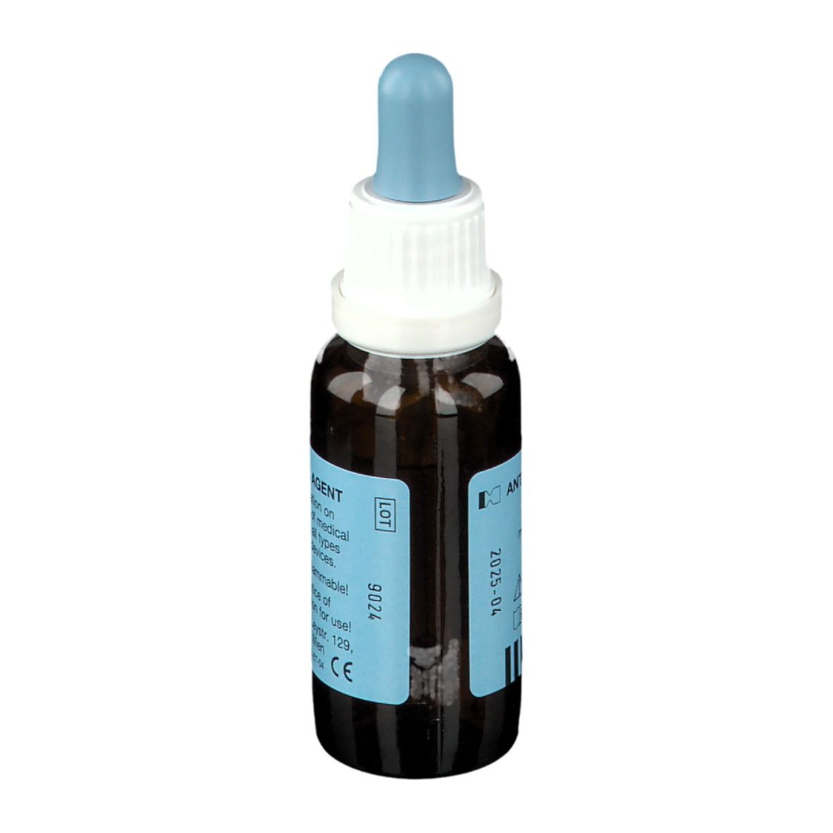 Bruine glazen fles met druppelaar en blauwe dop. Etiket met tekst en CE-markering.