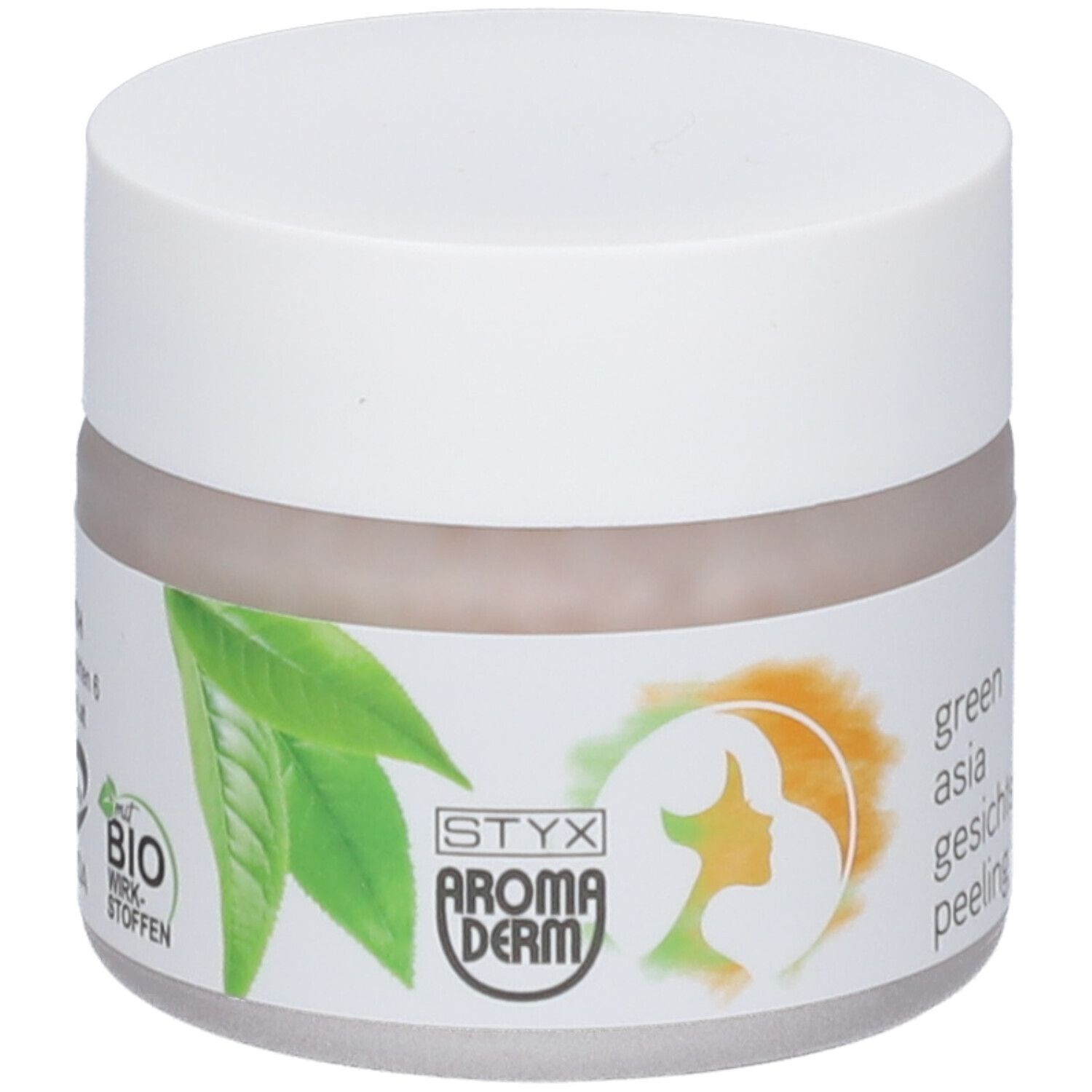 Pot de crème avec couvercle blanc. Étiquette avec feuilles vertes, silhouette de visage féminin et texte.