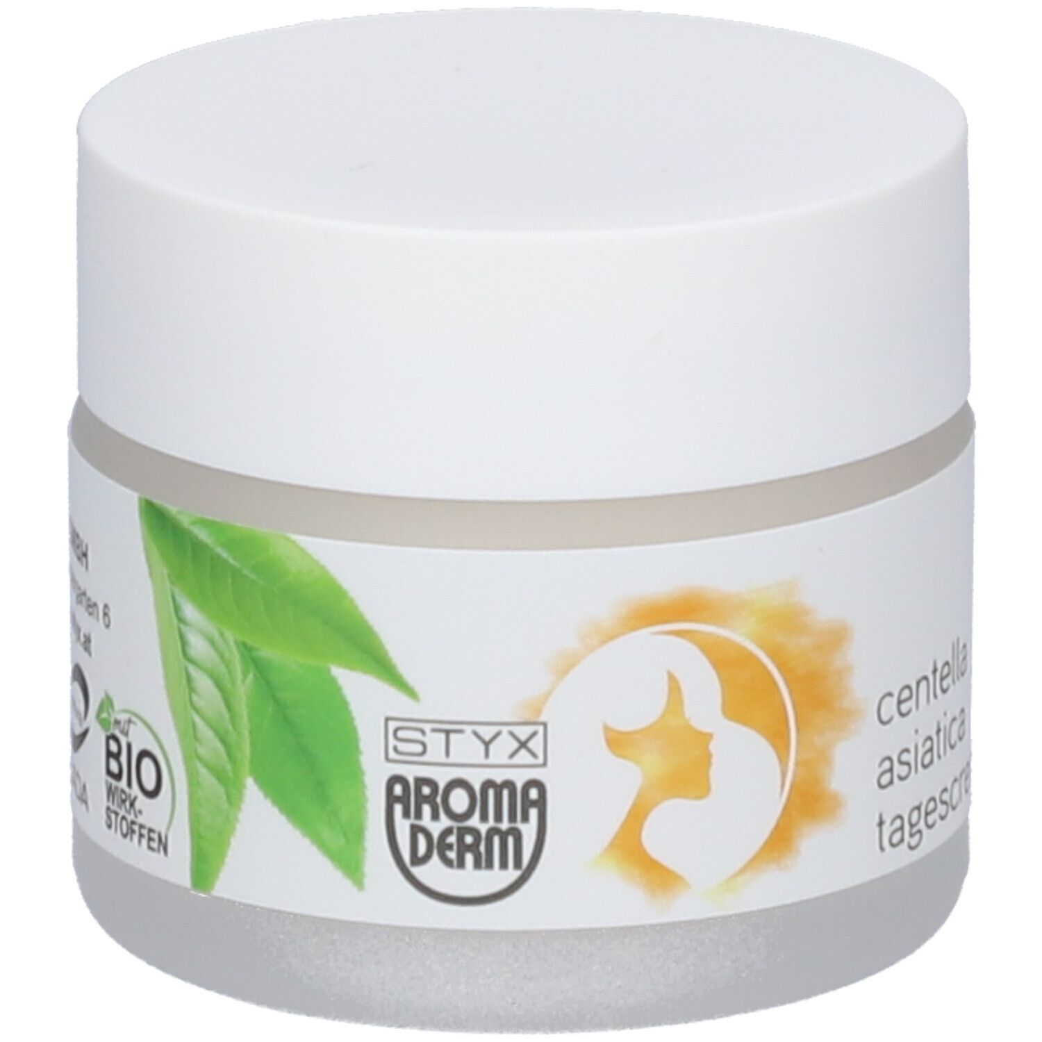 Pot de crème avec couvercle blanc. Étiquette avec logo, feuilles et texte: Centella Asiatica Tagescreme. Certification BIO.