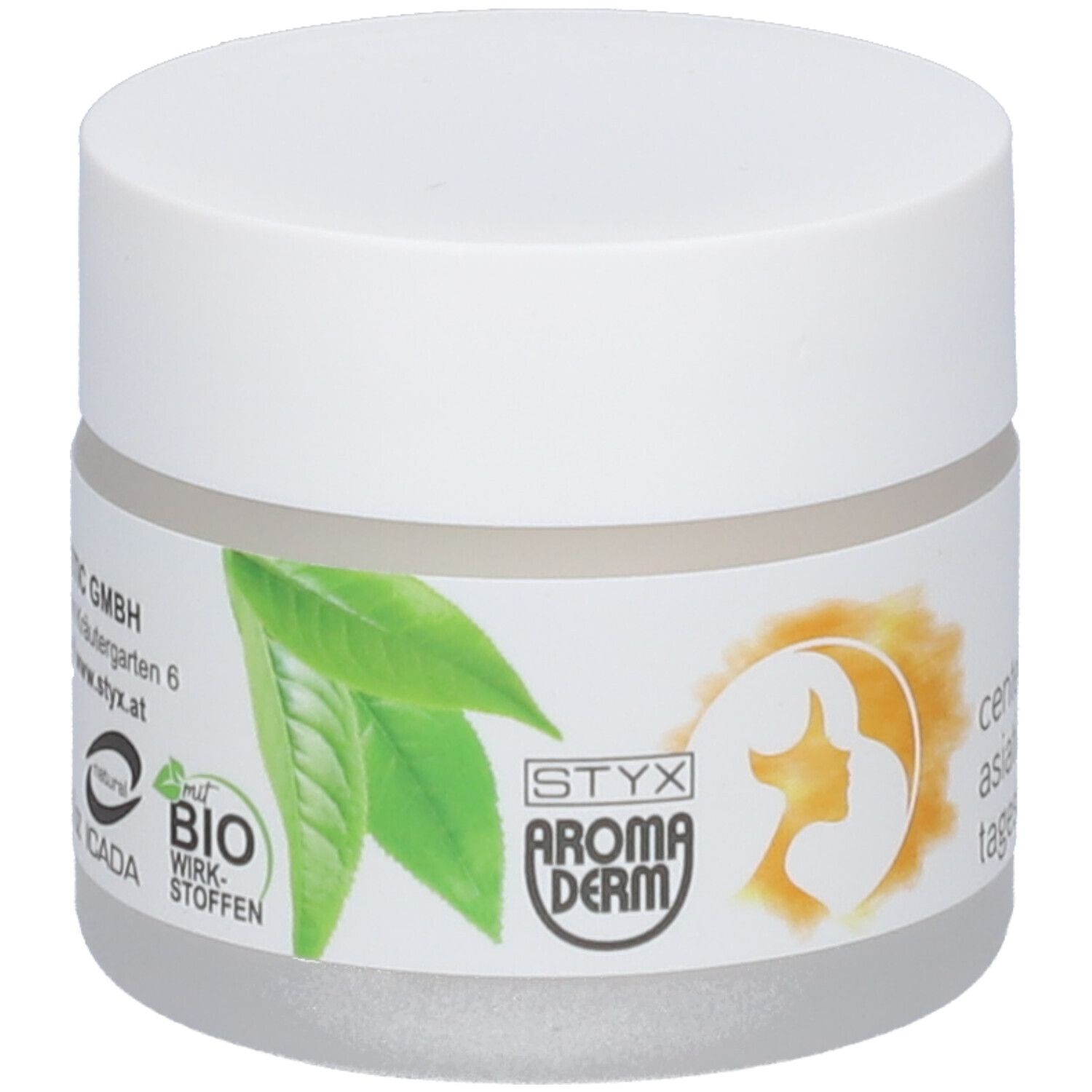 Pot de crème avec couvercle blanc. Étiquette avec logo, feuilles et texte: Centella Asiatica Tagescreme. Certification BIO.