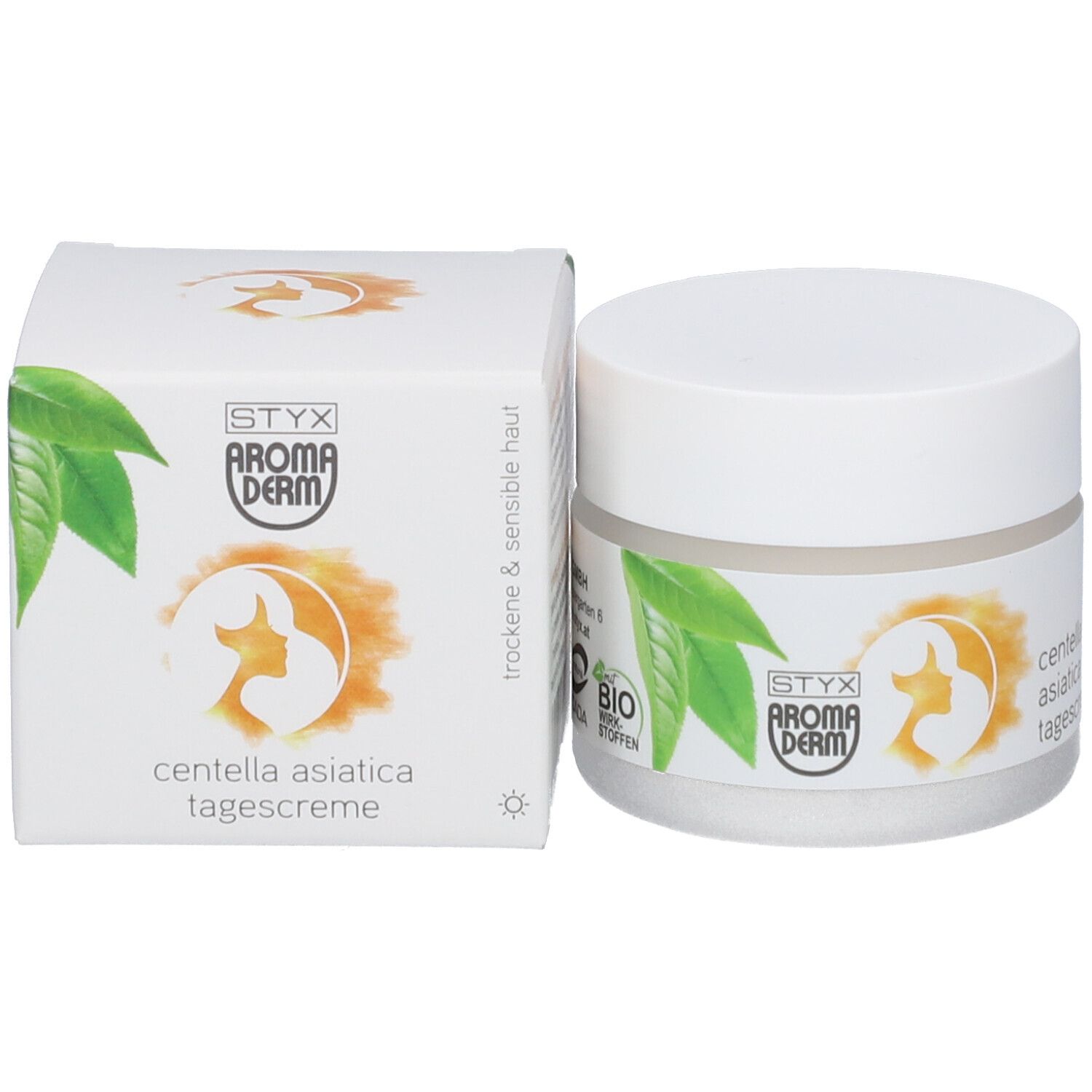 Pot de crème et carton. Carton avec logo, feuilles et texte: Centella Asiatica Tagescreme. Pour peaux sèches et sensibles. BIO.