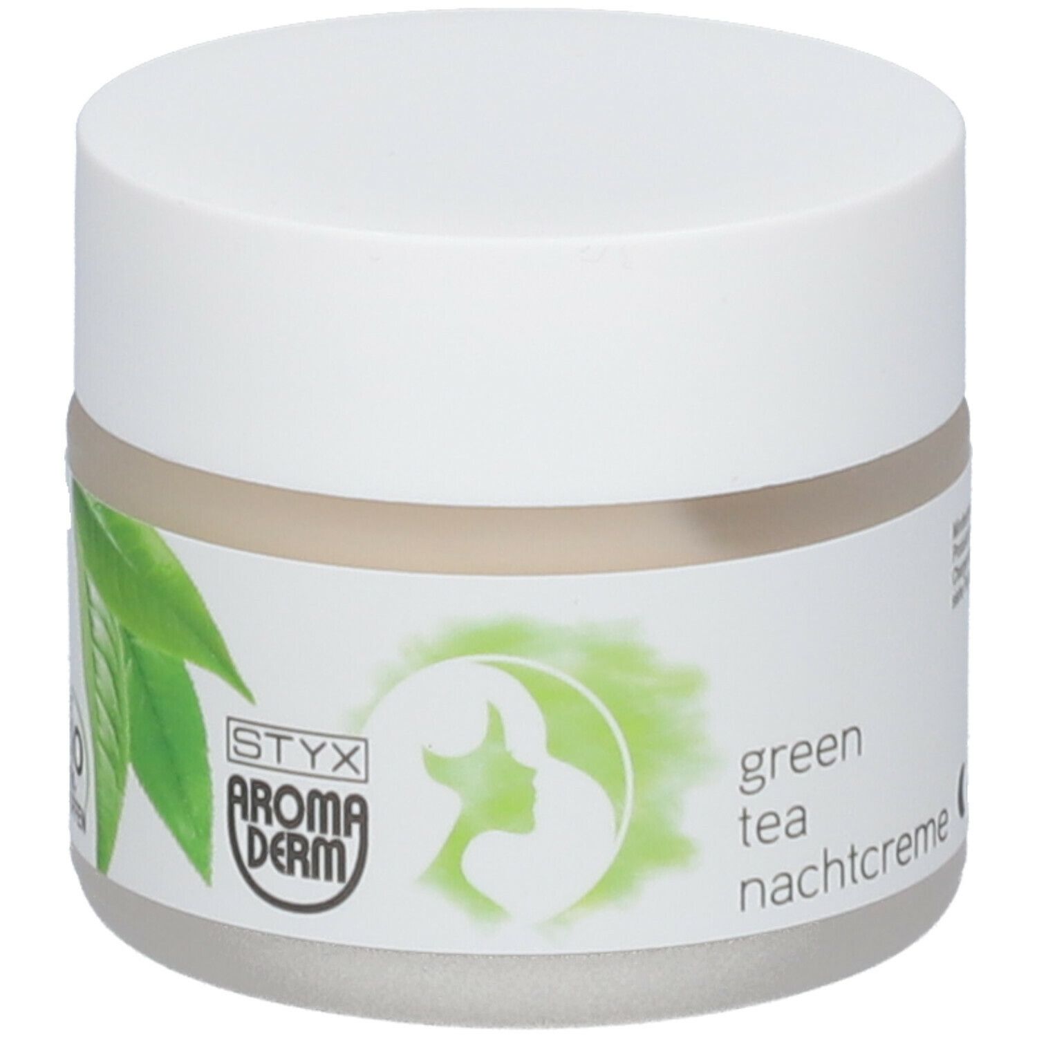 Pot de crème avec couvercle blanc. Étiquette : STYX AROMADERM, feuilles vertes, crème de nuit au thé vert, label bio.