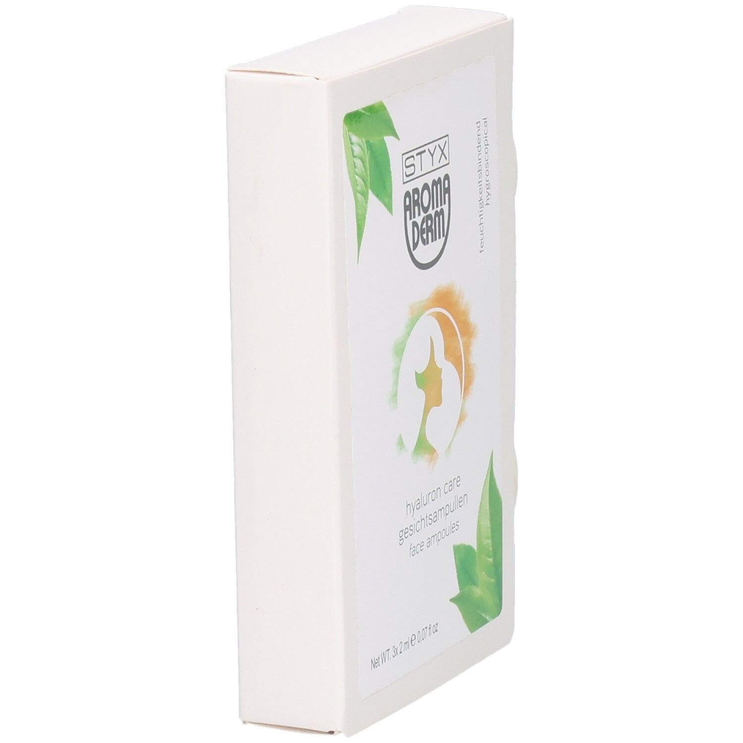 Boîte STYX AROMADERM Hyaluron Care Gesichtsampullen, en biais. Logo, nom du produit et feuilles vertes.