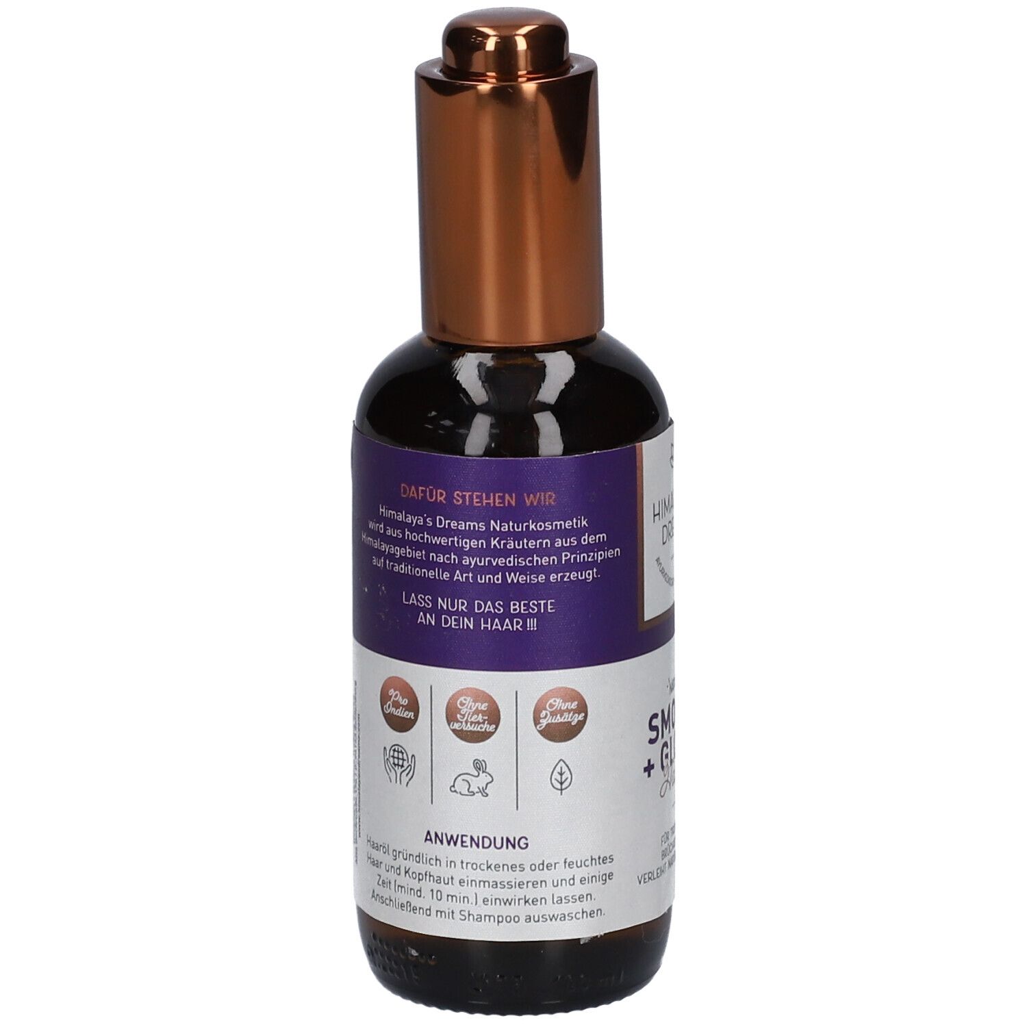 Achterkant van de fles. Tekst: Himalaya's Dreams Naturkosmetik. Gebruiksaanwijzing. Paars etiket met tekst en logo's.