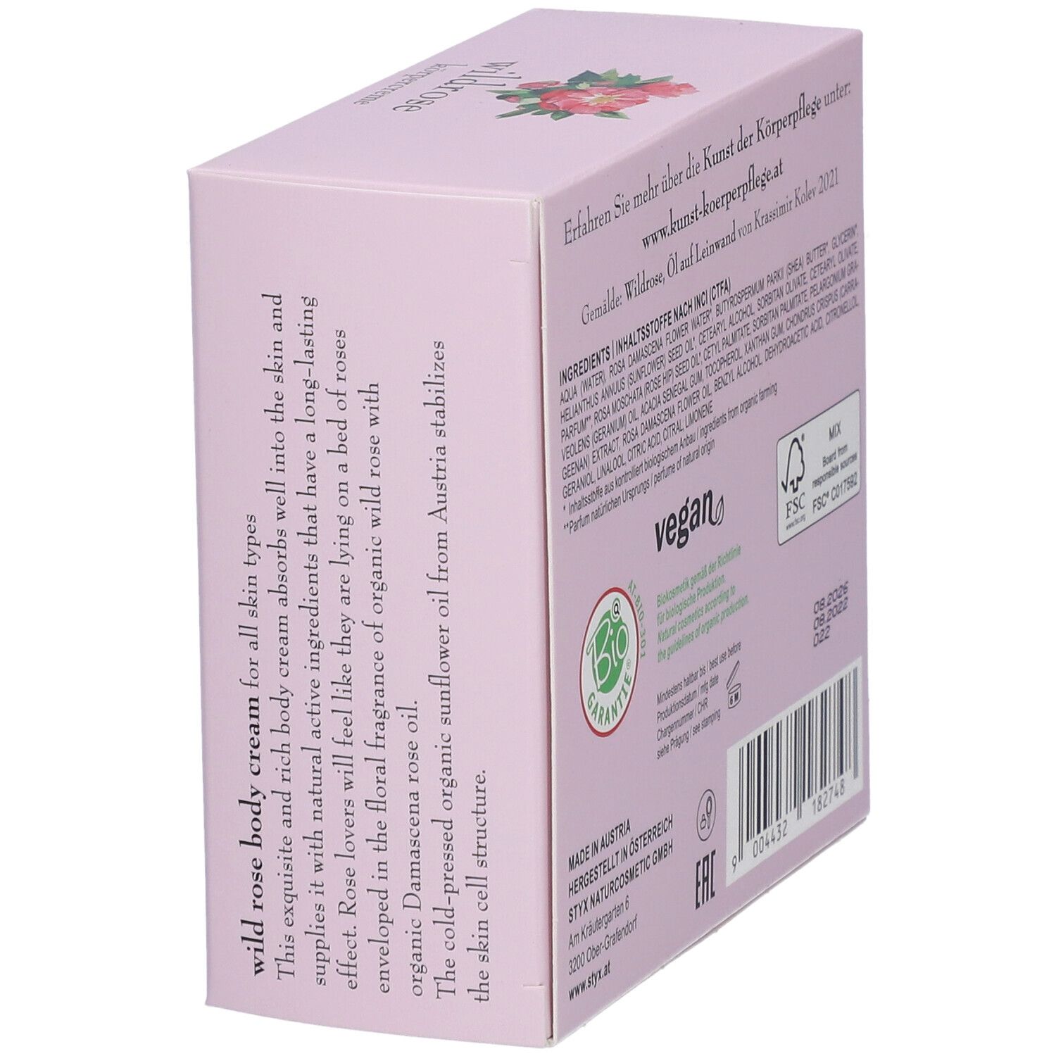 Schuinstaande roze verpakking. Tekst: wilde roos bodycrème, bio-kwaliteit, ingrediënten, FSC zegel.