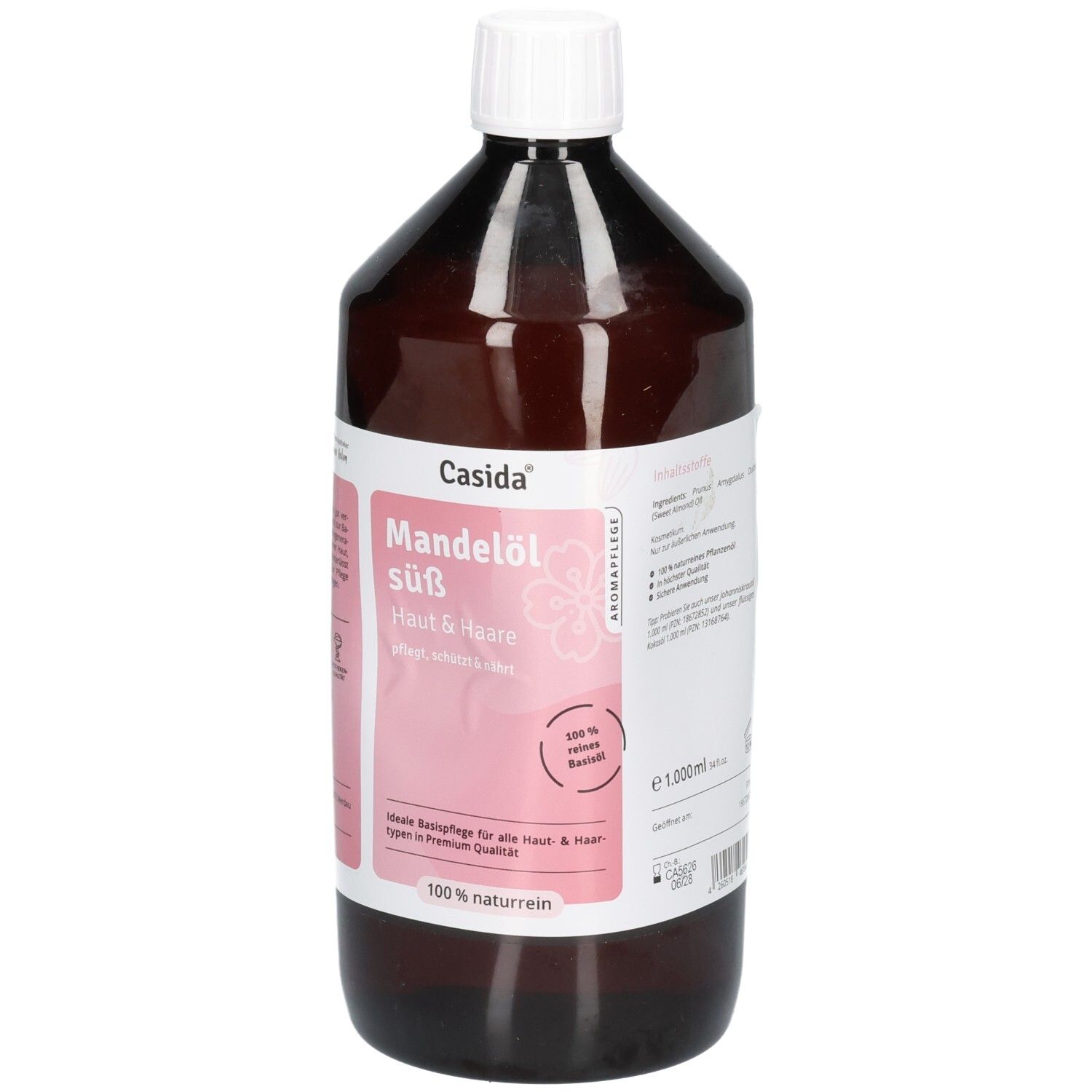 Flacon brun avec bouchon blanc. Étiquette avec nom du produit et marque Casida. Texte : Huile d'amande douce, 100% naturelle, 1.000ml.