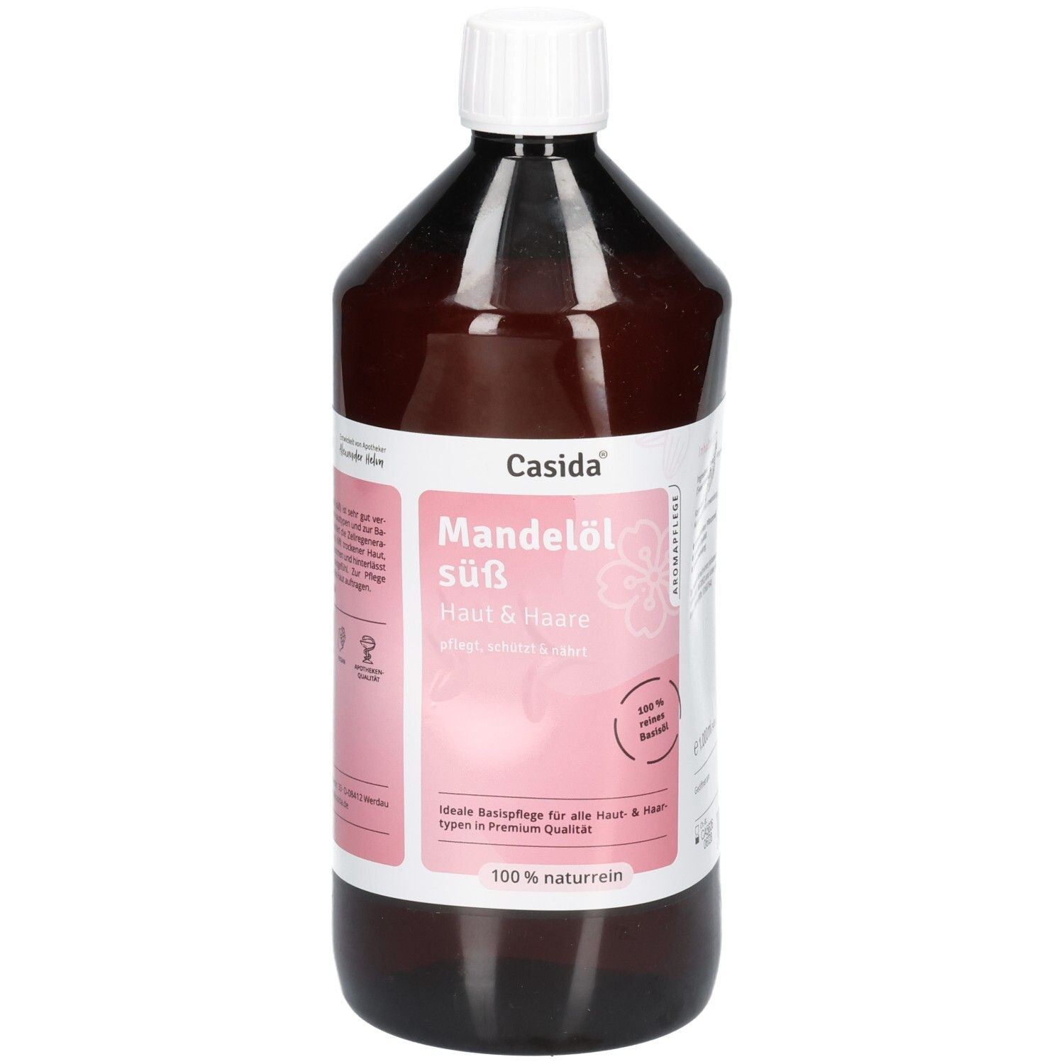 Flacon brun avec bouchon blanc. Étiquette avec nom du produit et marque Casida. Texte : Huile d'amande douce, 100% naturelle.