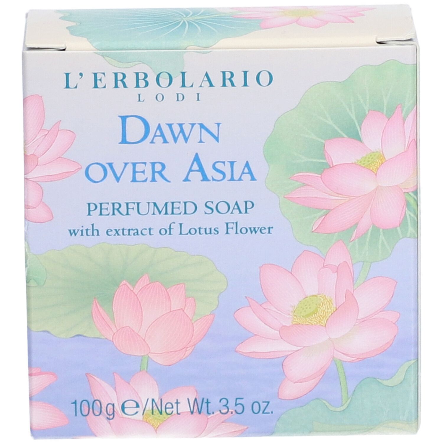 Boîte avec fleurs de lotus roses et texte "Dawn Over Asia". Contient du savon parfumé à l'extrait de fleur de lotus. 100g.