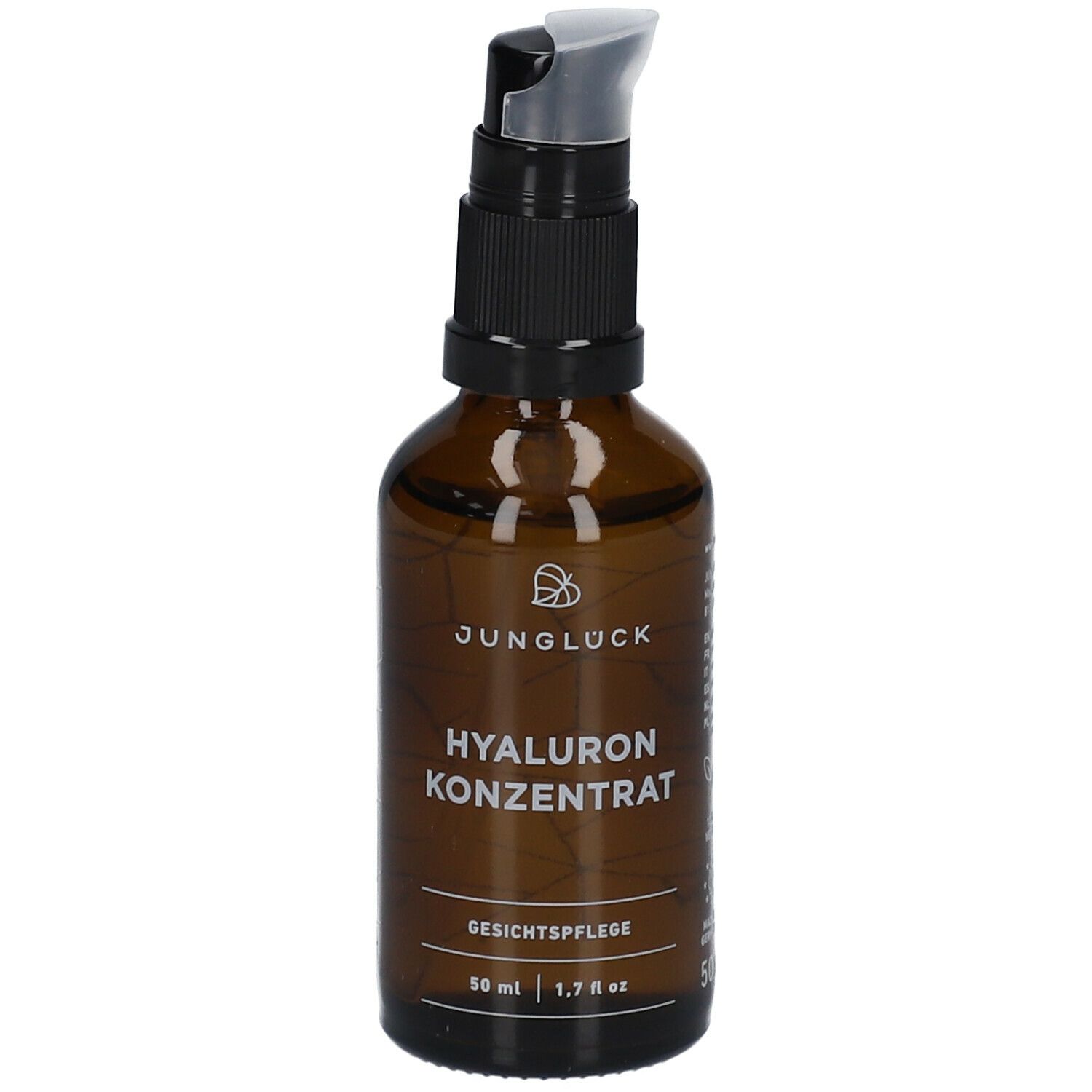 Flacon en verre brun avec pompe noire. Inscription : JUNGLÜCK Hyaluron Konzentrat, soin du visage. 50 ml.