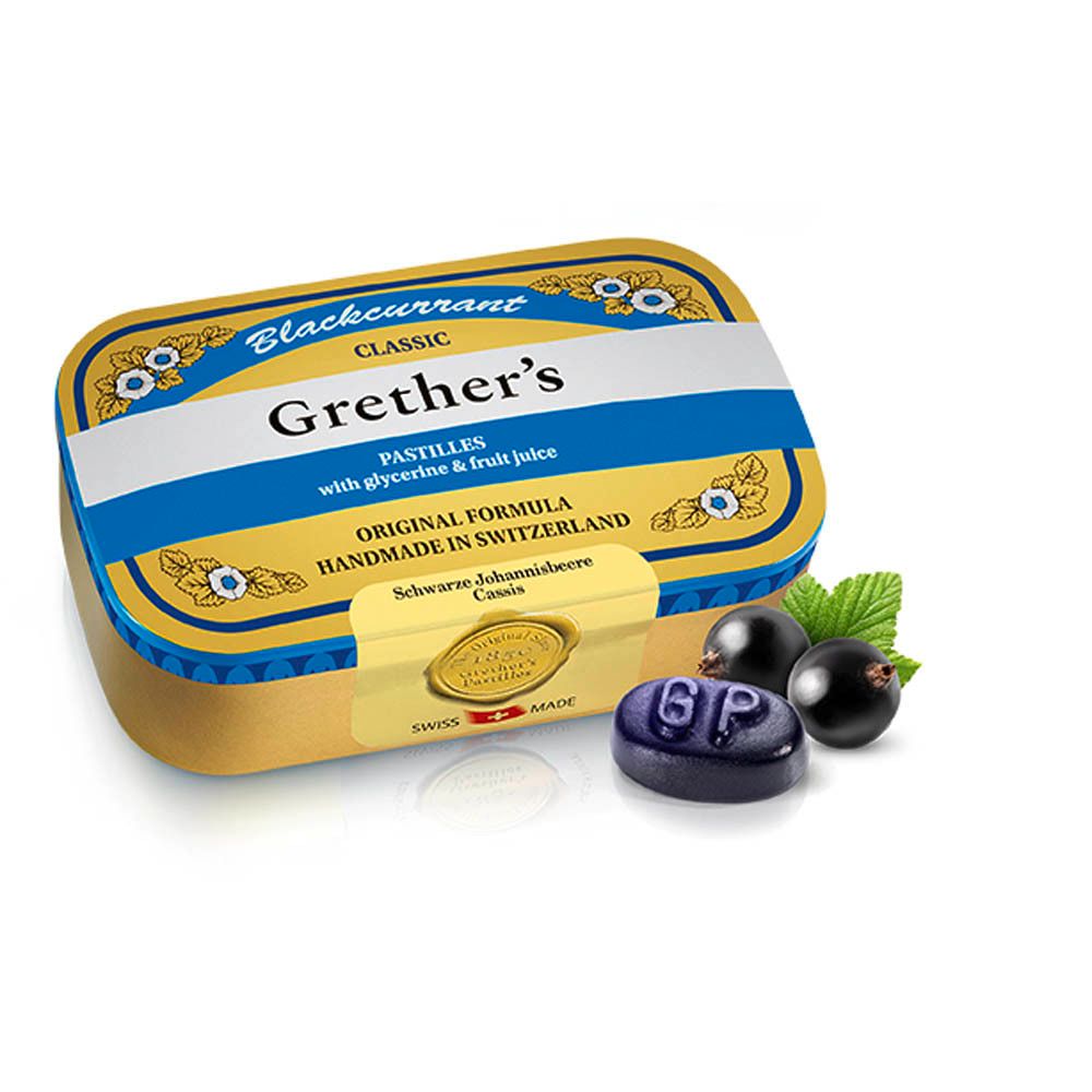 Goudkleurige doos met blauw-witte tekst. Bevat pastilles en zwarte bessen. Opschrift: Grether's Pastilles, Swiss Made.