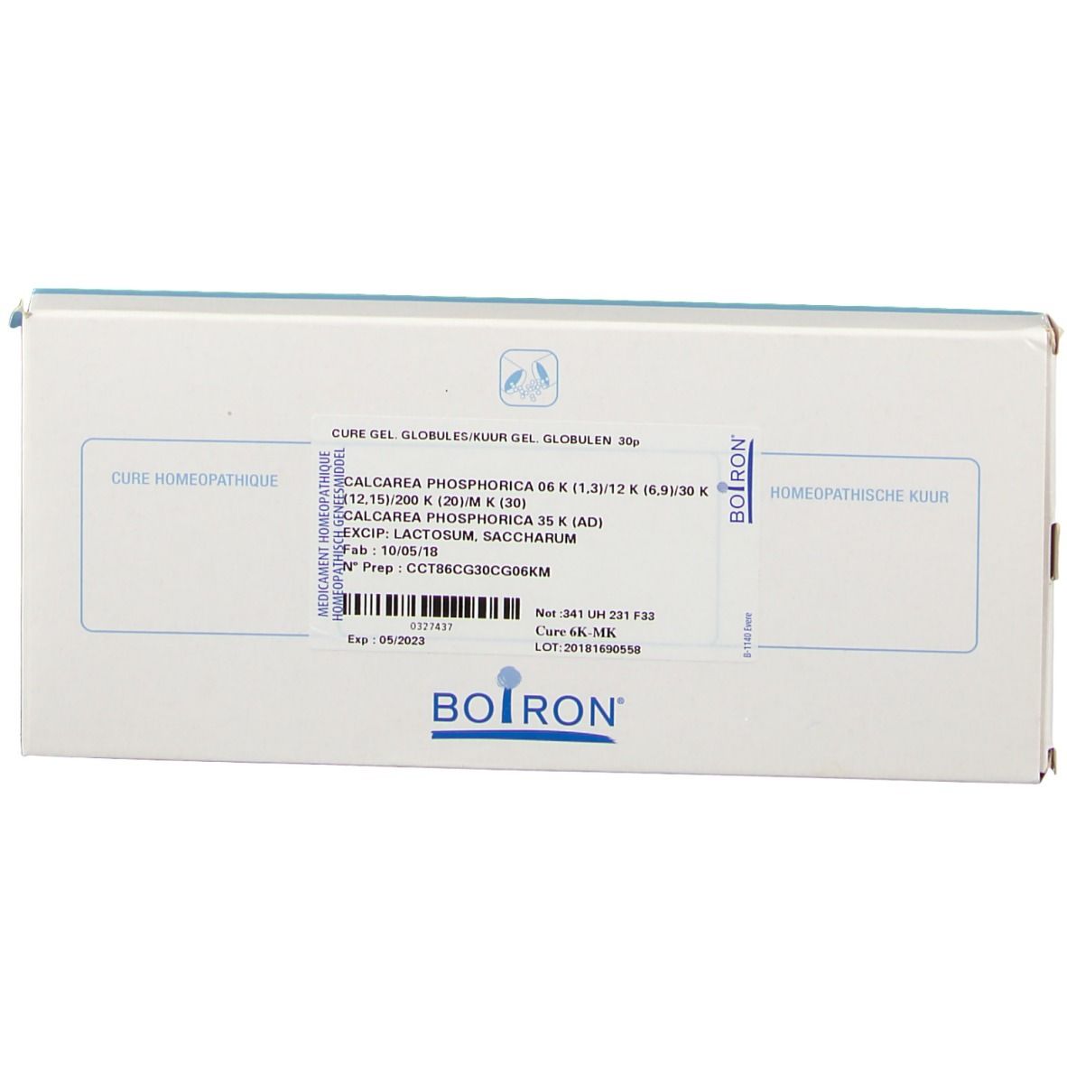 Boîte blanche à bordure bleue. Inscriptions: CALCAREA PHOSPHORICA, logo BOIRON. Texte en allemand et français.