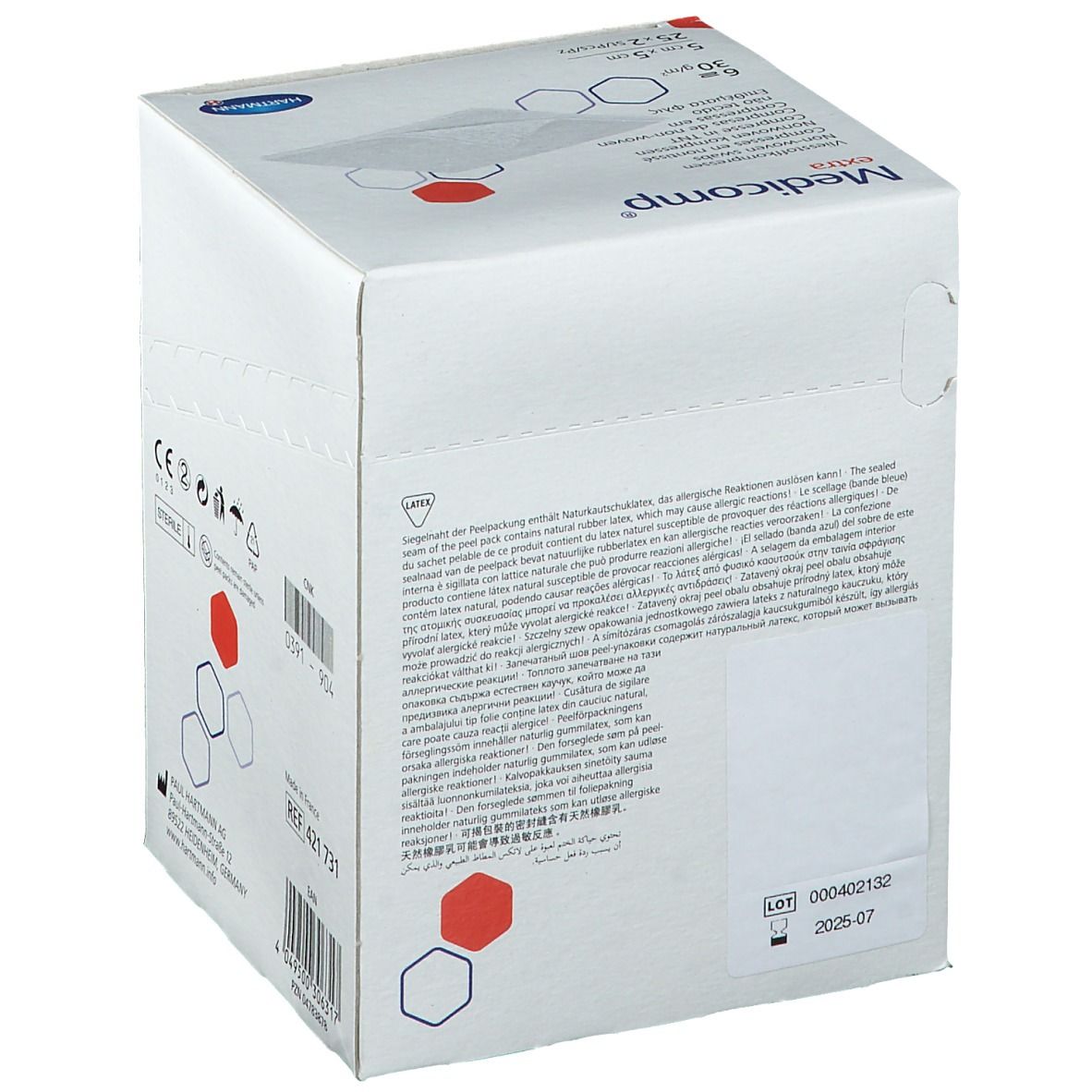 Verpakking met "Medicomp extra" logo. Meertalige tekst. Bevat steriele kompressen. Fabrikant: Hartmann. Met lotnummer.