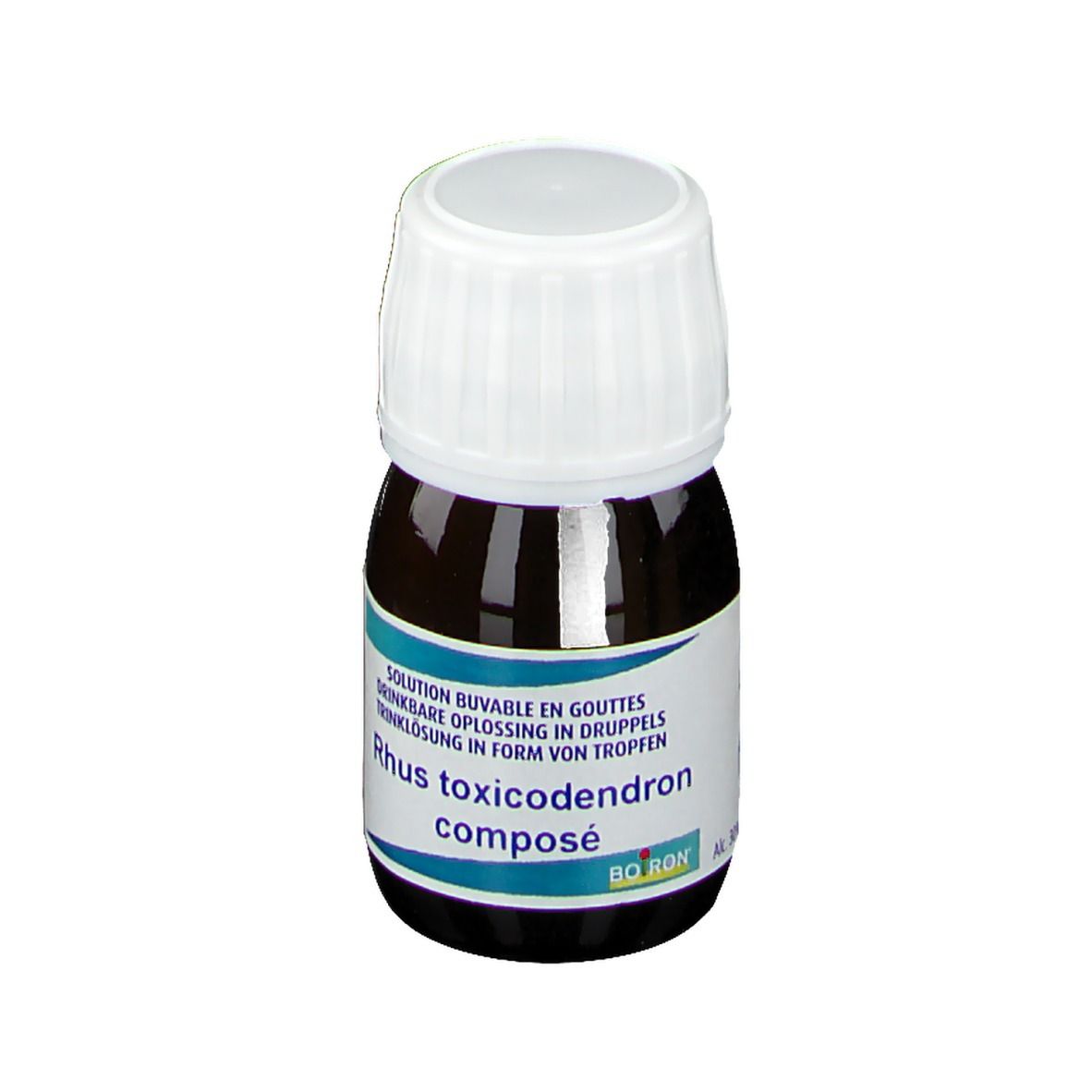 Flacon brun, bouchon blanc. Étiquette: Rhus toxicodendron composé, Boiron. Solution buvable en gouttes.