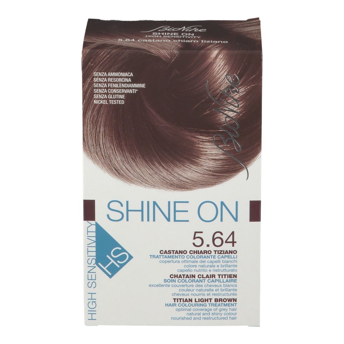 Boîte de coloration capillaire. Marque Bionike, nom du produit Shine On 5.64. Brun châtain. Sans ammoniaque, résorcine, conservateurs, gluten. Testé au nickel.