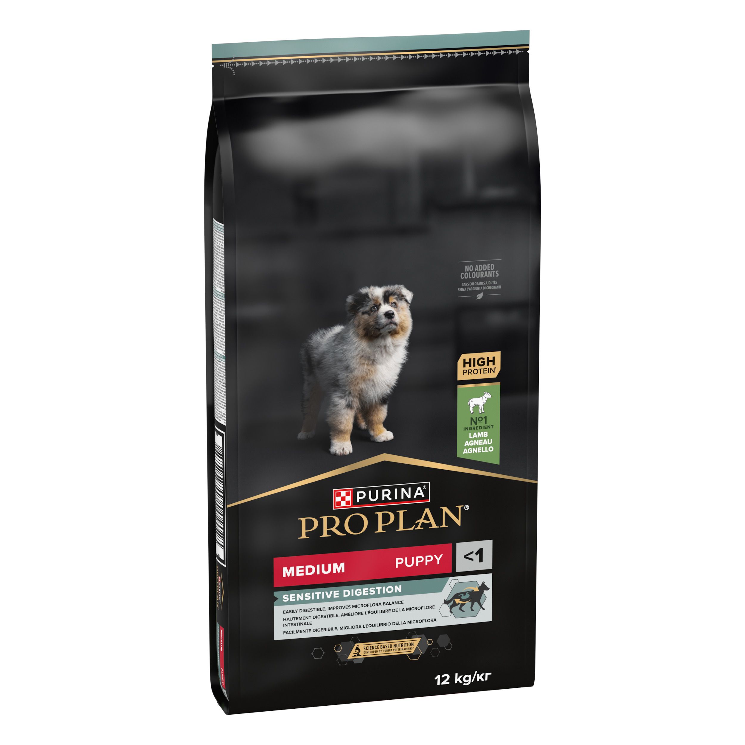 Sac noir de nourriture pour chiens. Inscription : PURINA PRO PLAN, Medium, Puppy, Sensitive Digestion. Image d'un chiot.