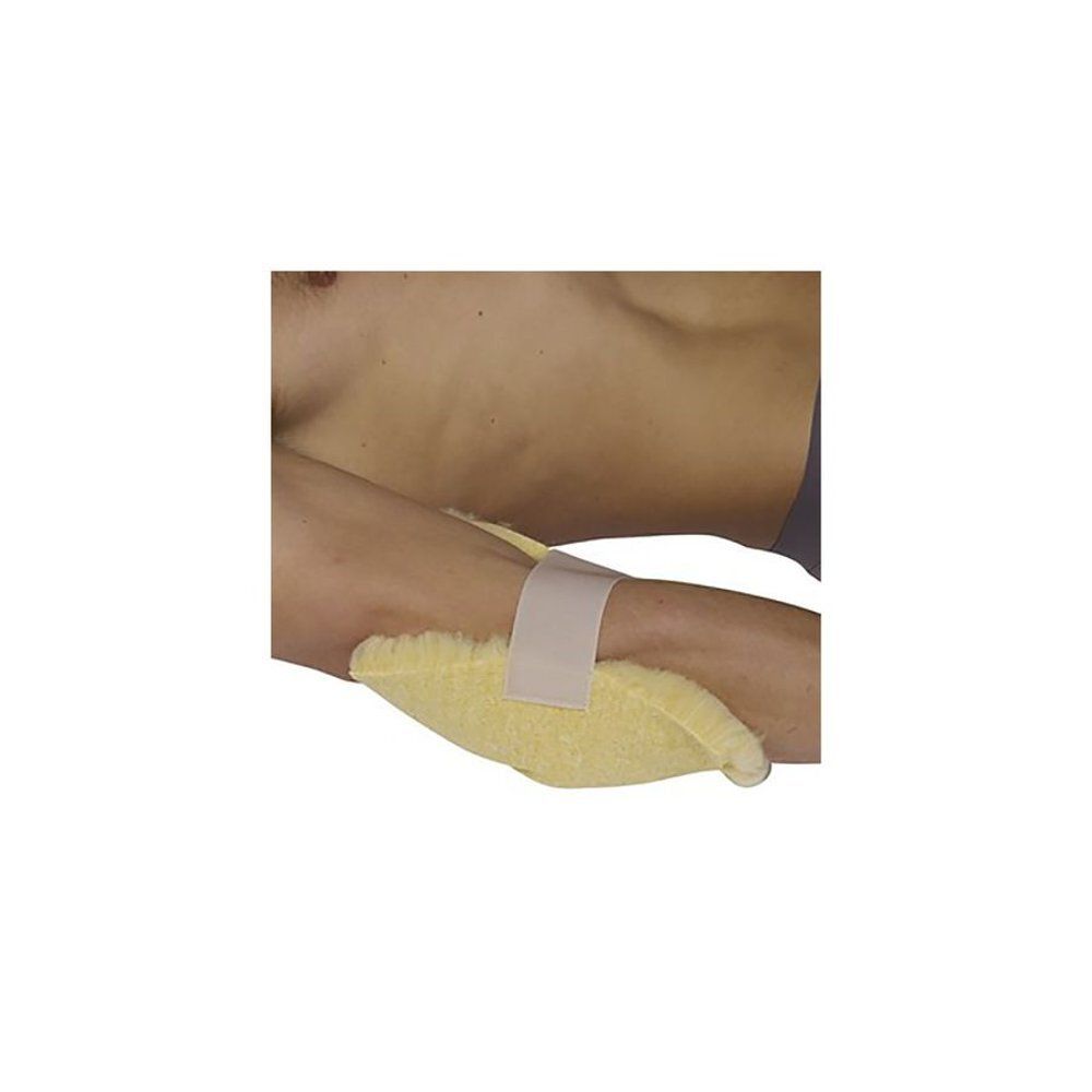 Botapad Ellebow Protector Beige sur le bras d'une personne. Le protège-coude est fixé avec une bande.