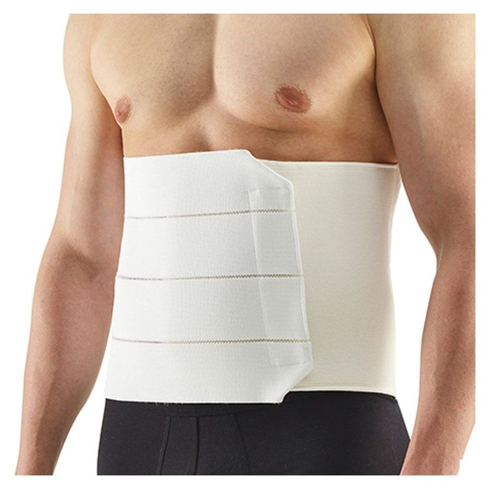 Ceinture abdominale beige portée. Plusieurs bandes horizontales. Fermeture velcro sur le côté droit.
