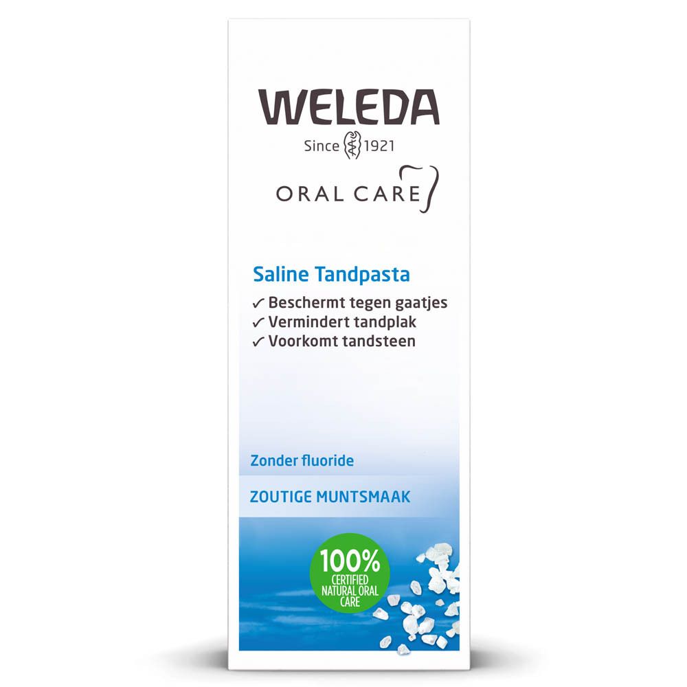 Weleda Saline tandpasta tube. Wit, met blauwe tekst en afbeeldingen. Bevat tekst in het Duits, Frans en Nederlands. 100% natuurlijk.