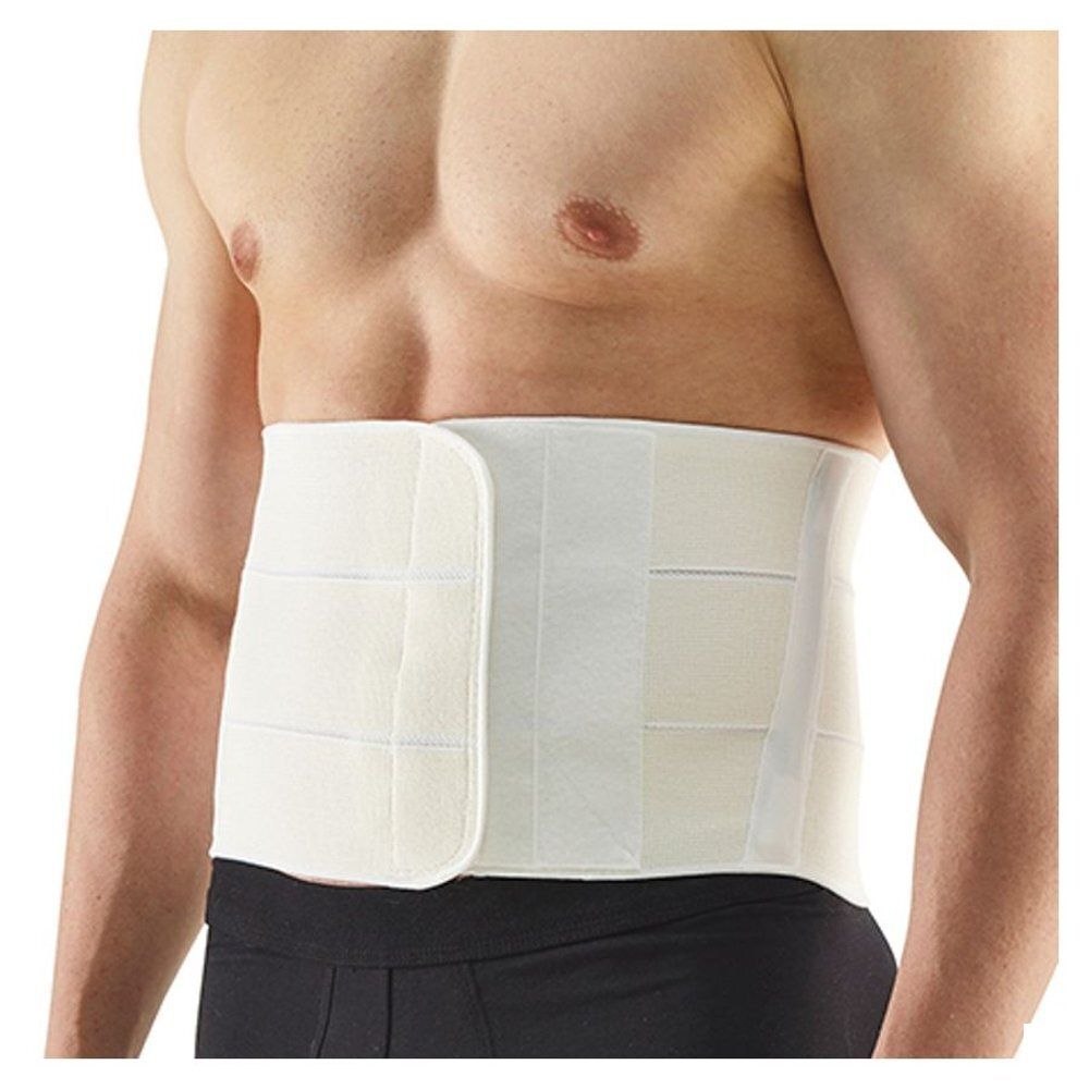 Ceinture abdominale. Beige, avec fermeture velcro. Rembourrée, avec renforts verticaux. Portée sur le corps.
