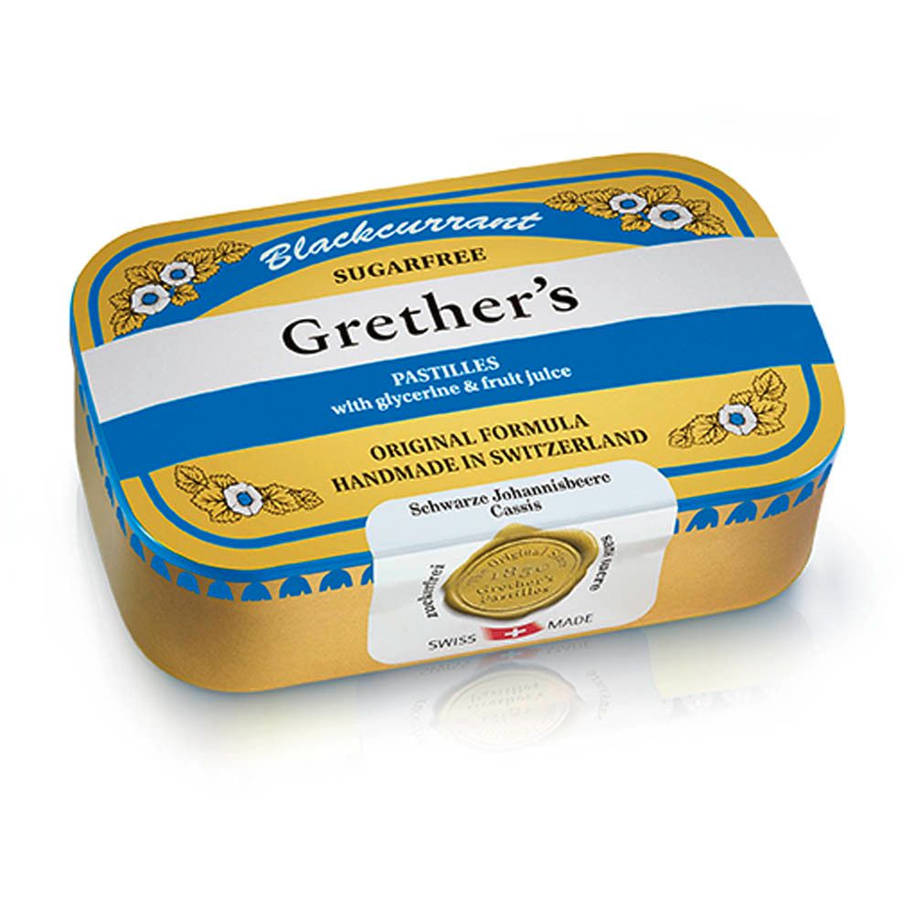 Gouden doos met blauwe en witte letters. Opschrift: Grether's Pastilles, suikervrij. Gemaakt in Zwitserland.