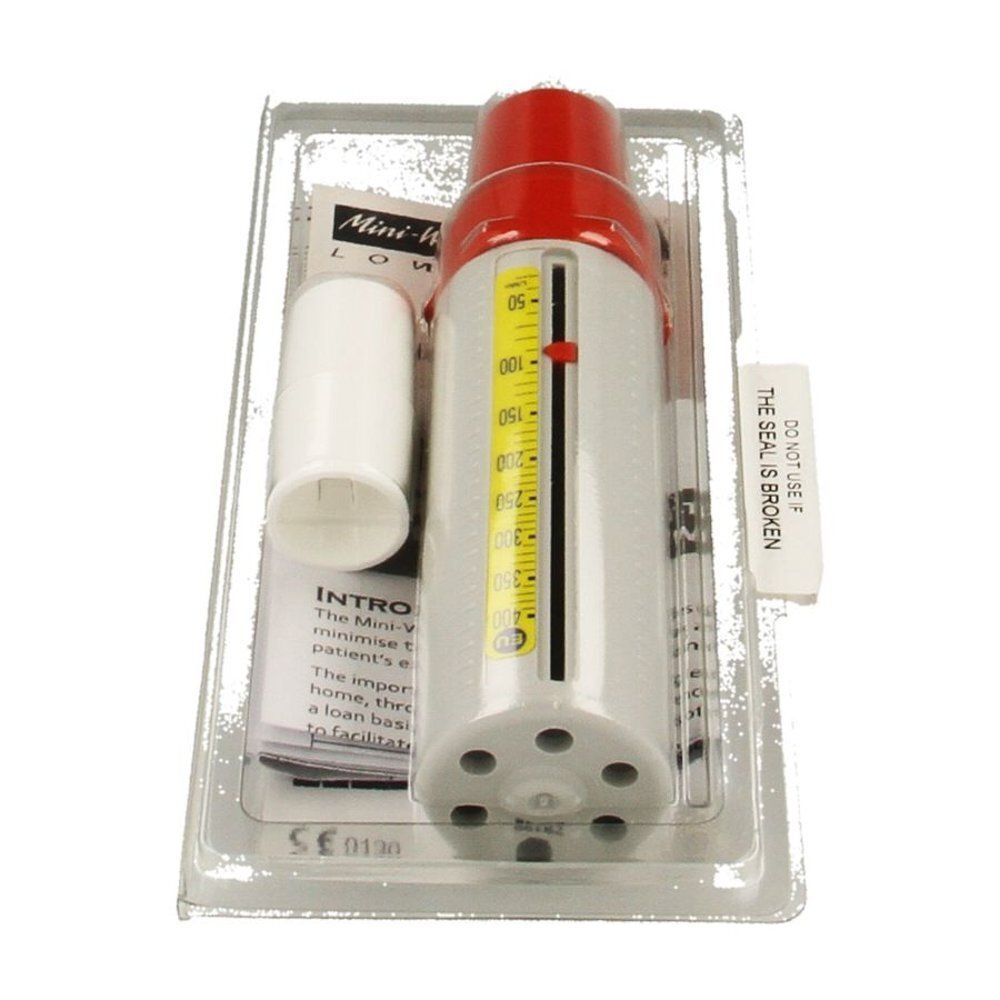 Appareil de mesure de la fonction pulmonaire. Boîtier gris, embout rouge. Échelle jaune avec chiffres. Emballage plastique. Notice jointe.