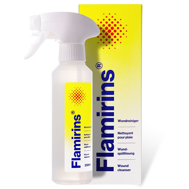 Flacon avec pulvérisateur. Inscription Flamirins, Nettoyant pour plaie, Wound cleanser.