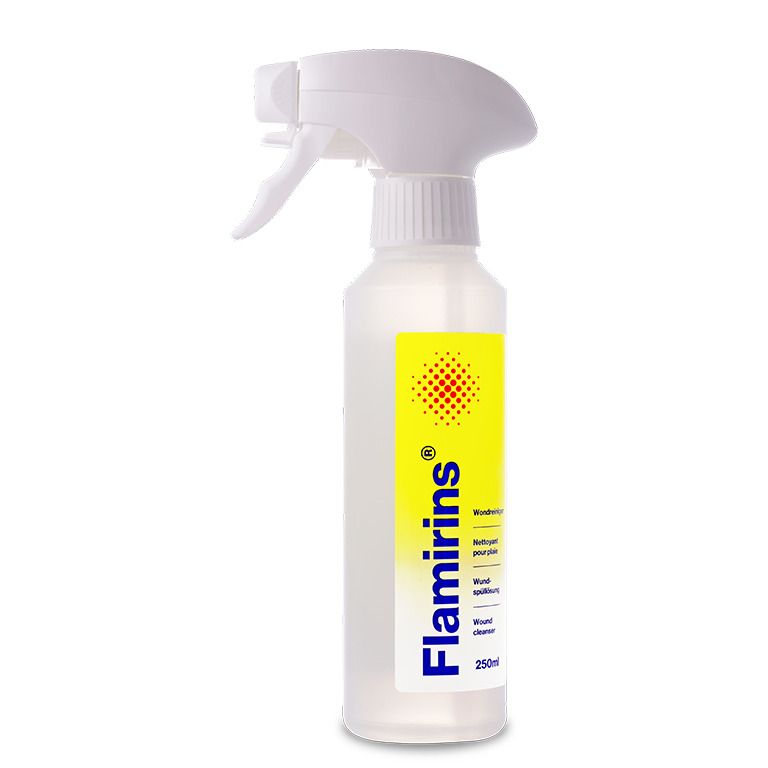 Flacon avec pulvérisateur. Inscription Flamirins, Nettoyant pour plaie, Wound cleanser.