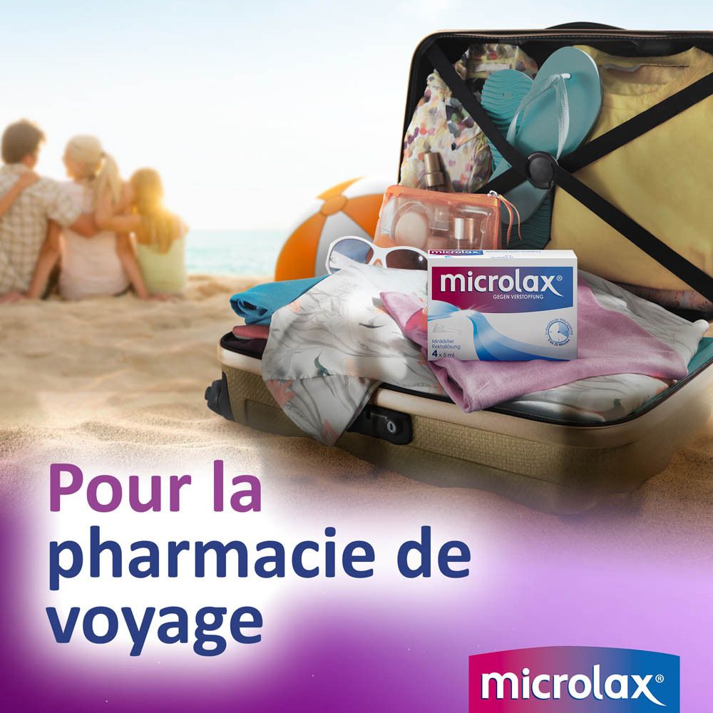 Valise sur la plage. Emballage Microlax visible. Texte : Pour la pharmacie de voyage. Logo Microlax.