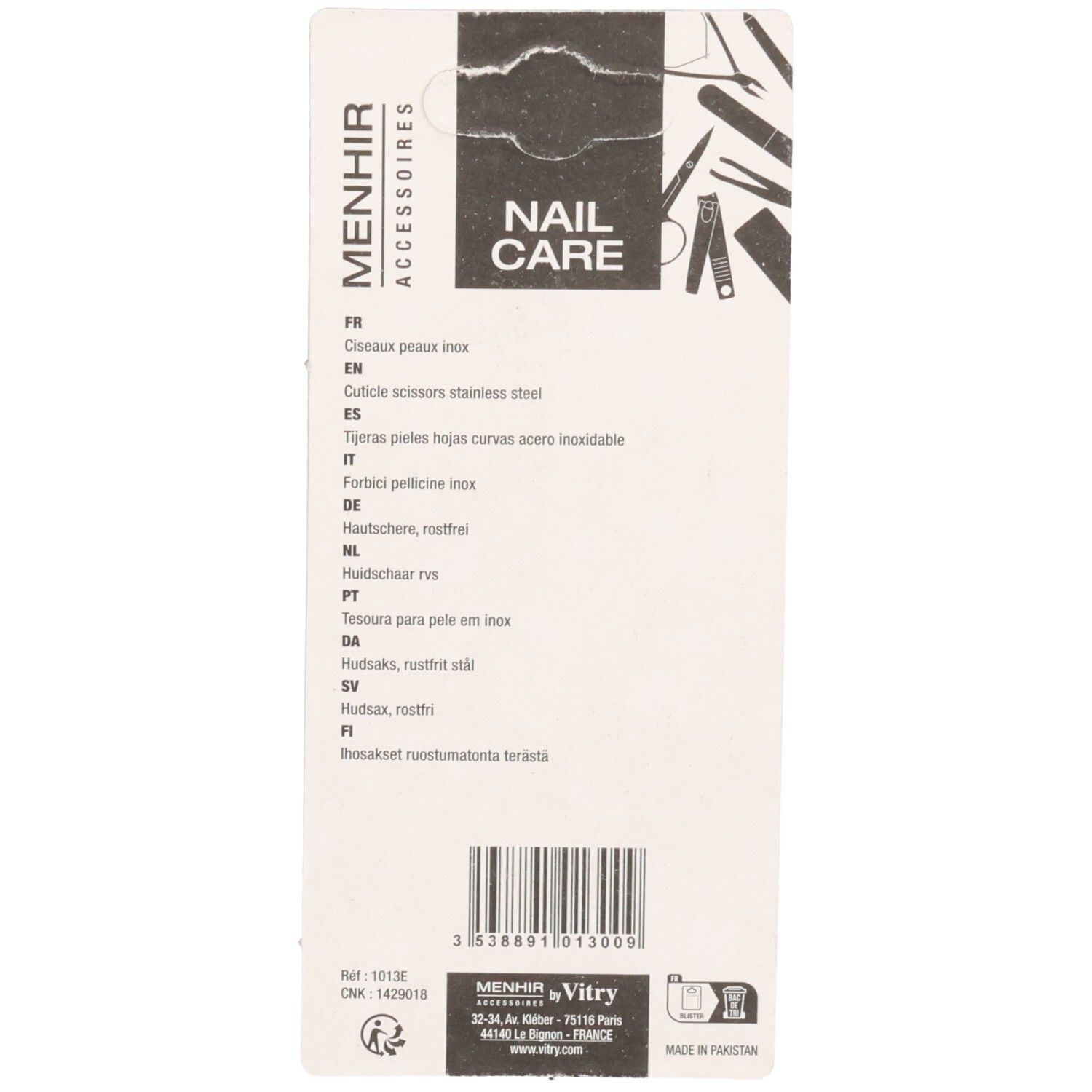 Achterkant van de verpakking van de nagelschaar. Productnaam en merk. Meertalige productbeschrijvingen.