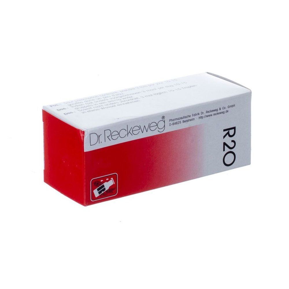 Boîte en carton rouge et blanc. Inscription: Dr. Reckeweg, R20. Logo avec flacon. Fabrique pharmaceutique.