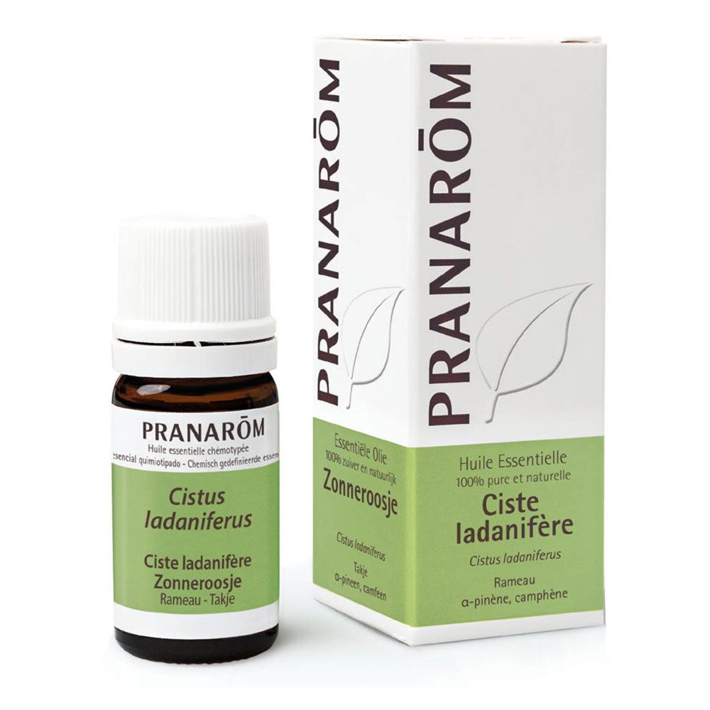 Bruine glazen fles en doos. Doos en fles met productnaam en merk: PRANAROM. Witte dop.