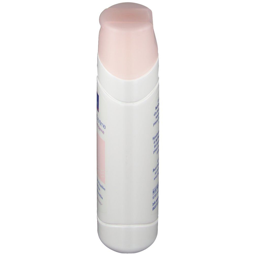 Vue latérale du flacon blanc avec bouchon rose. Nom du produit et détails visibles sur le devant.