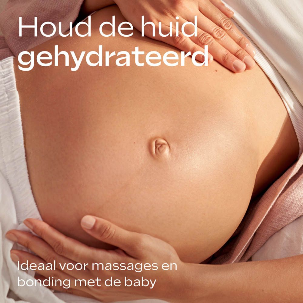 Weleda Zwangerschapsolie: close-up zwangere buik. Verbetert elasticiteit en stevigheid van de huid.