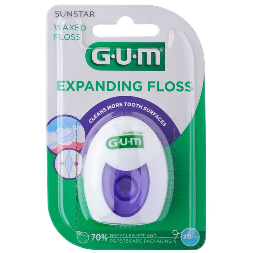 GUM® Expanding Floss in verpakking. Witte dispenser met paarse inzet. Groene verpakking met productnaam en logo.