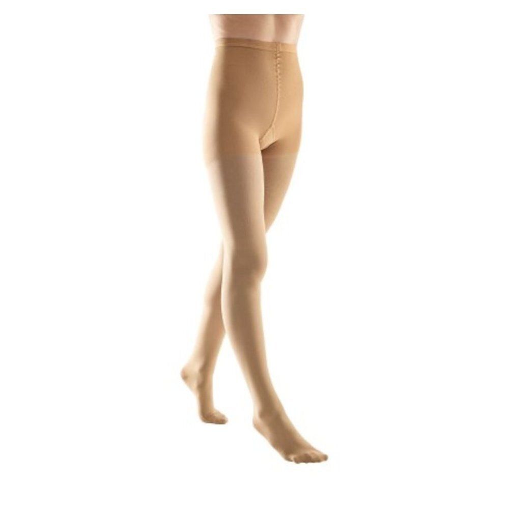 Huidkleurige compressiepanty. Zijaanzicht, toont de vorm en snit van het product.