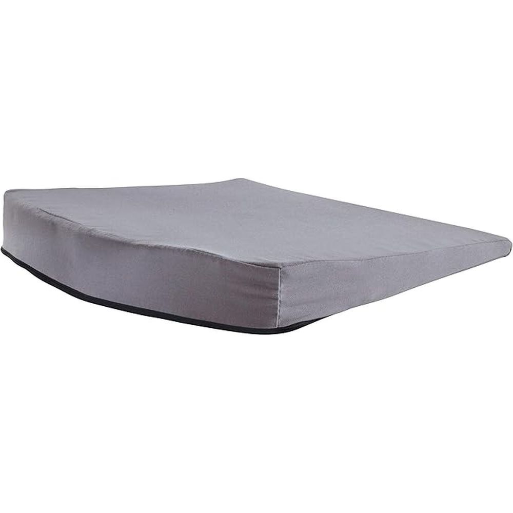Cale-siège gris, forme de coin. Bord noir en bas. Pas d'autres caractéristiques.