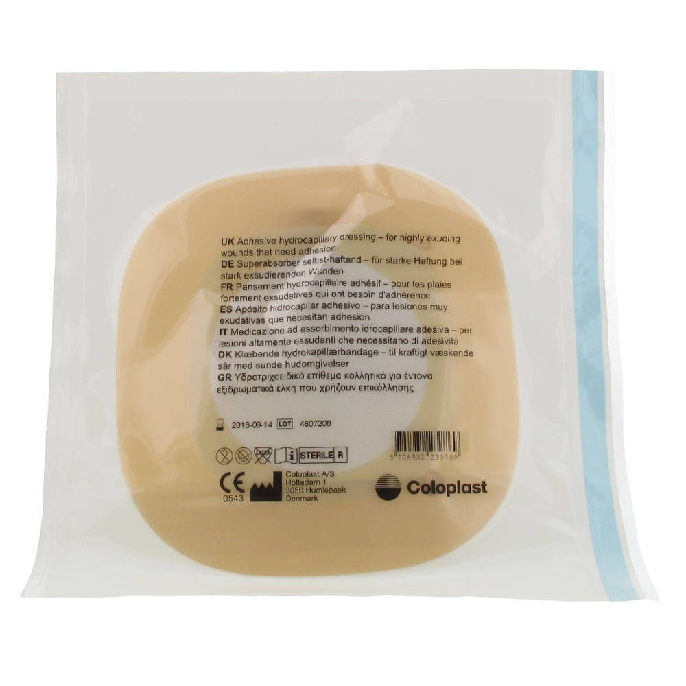 Adhesief hydrocapillair verband in verpakking. Vierkant met afgeronde hoeken, beige. Bedrukte productinformatie.