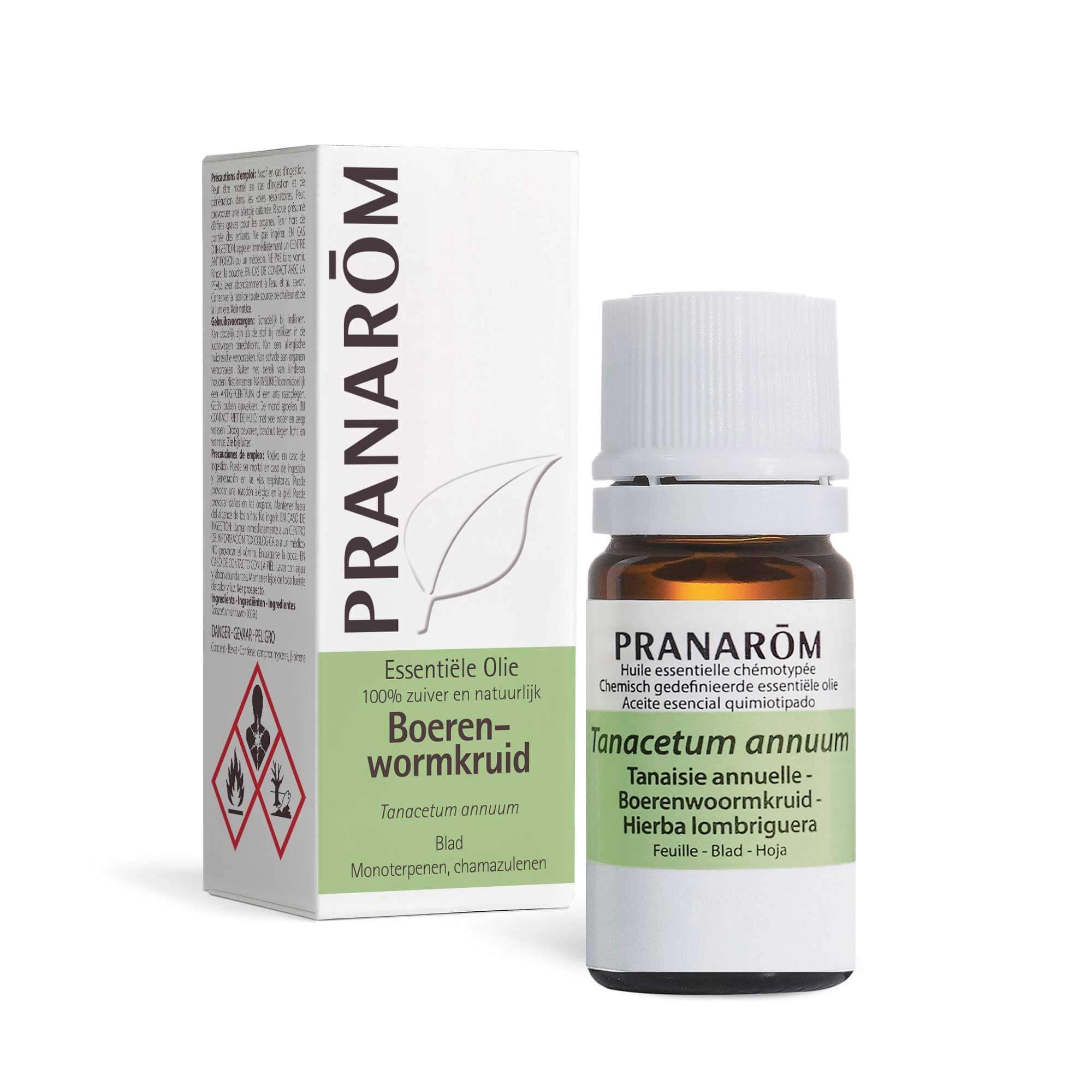 Bruine glazen fles met witte dop en etiket. Doos met productinformatie.