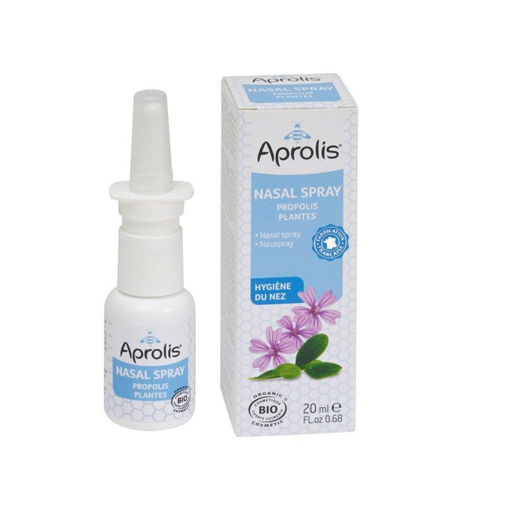 Spray nasal blanc avec applicateur et boîte. La boîte indique "Aprolis Nasal Spray".