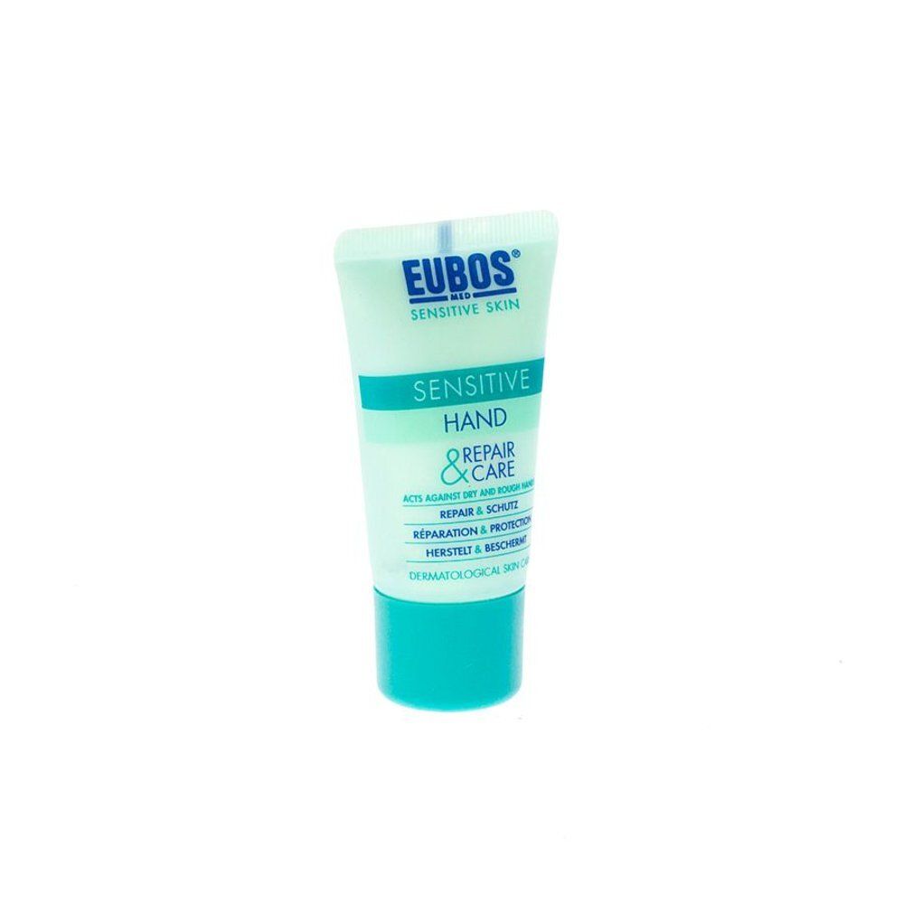 Lichtblauwe tube met witte tekst. Bovenin staat "EUBOS MED". Daaronder "SENSITIVE SKIN". Daaronder "SENSITIVE HAND REPAIR & CARE".
