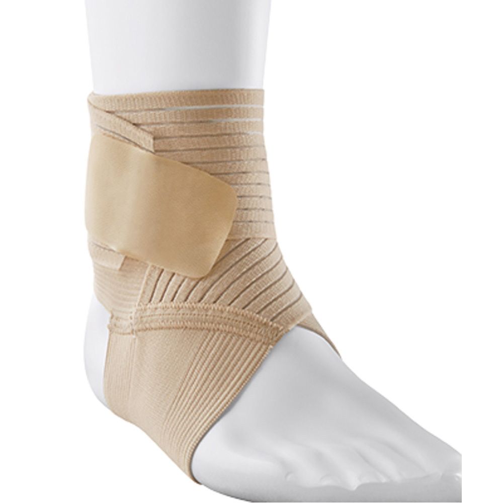 3M FUTURO enkelbandage, maat L, in verpakking. Beige bandage op voet. Teksten in het Duits, Nederlands, Frans, Italiaans.