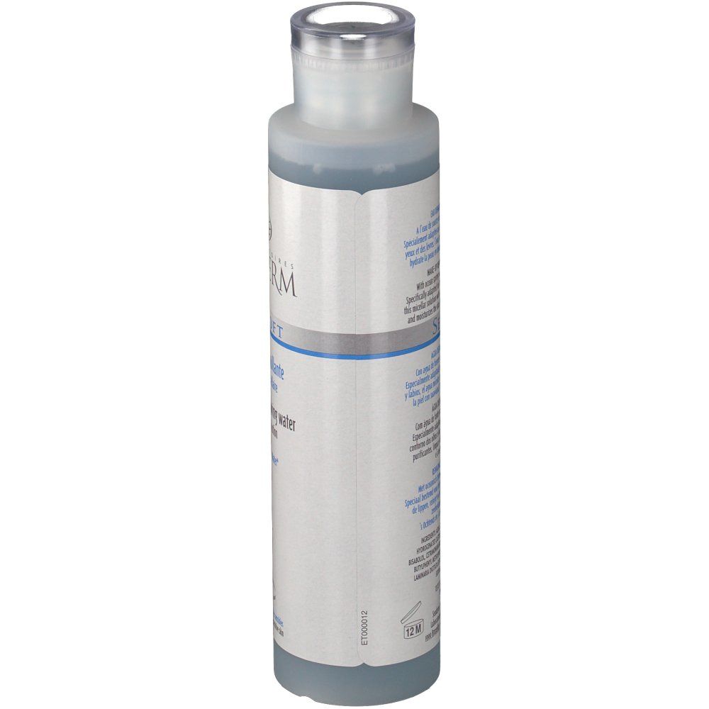 Flacon cylindrique, liquide bleu. Inscription: Seaderm Seasoft. Étiquette avec texte. Bouchon transparent.