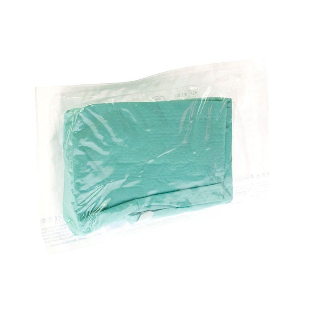Produit rectangulaire turquoise dans un emballage plastique transparent scellé. Vue de dessus.
