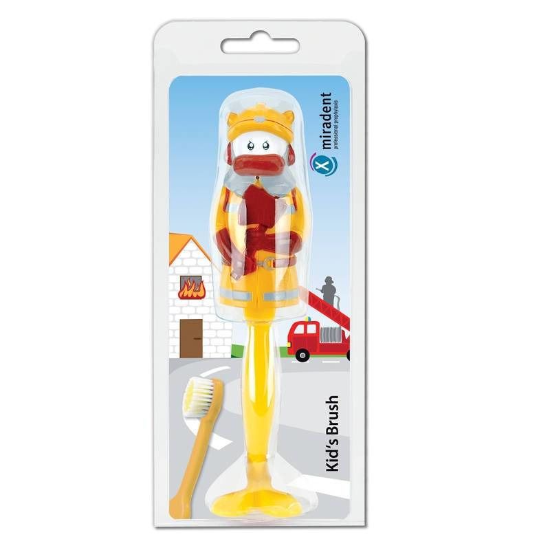 Tandenborstel in blisterverpakking. Gele handgreep, brandweerfiguur. "miradent" logo. Opschrift "Kid's Brush".