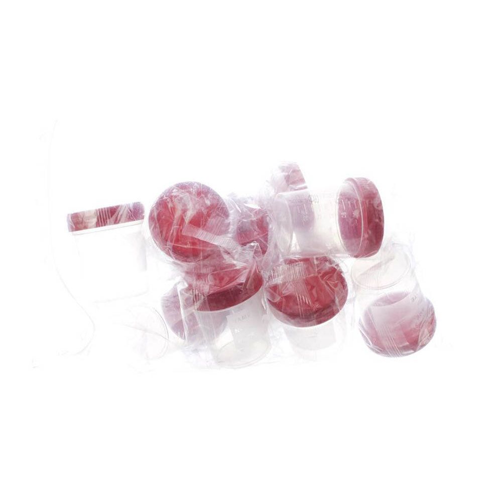 Comprimés ronds rouges, emballés individuellement dans du plastique transparent. Plusieurs comprimés sont visibles.